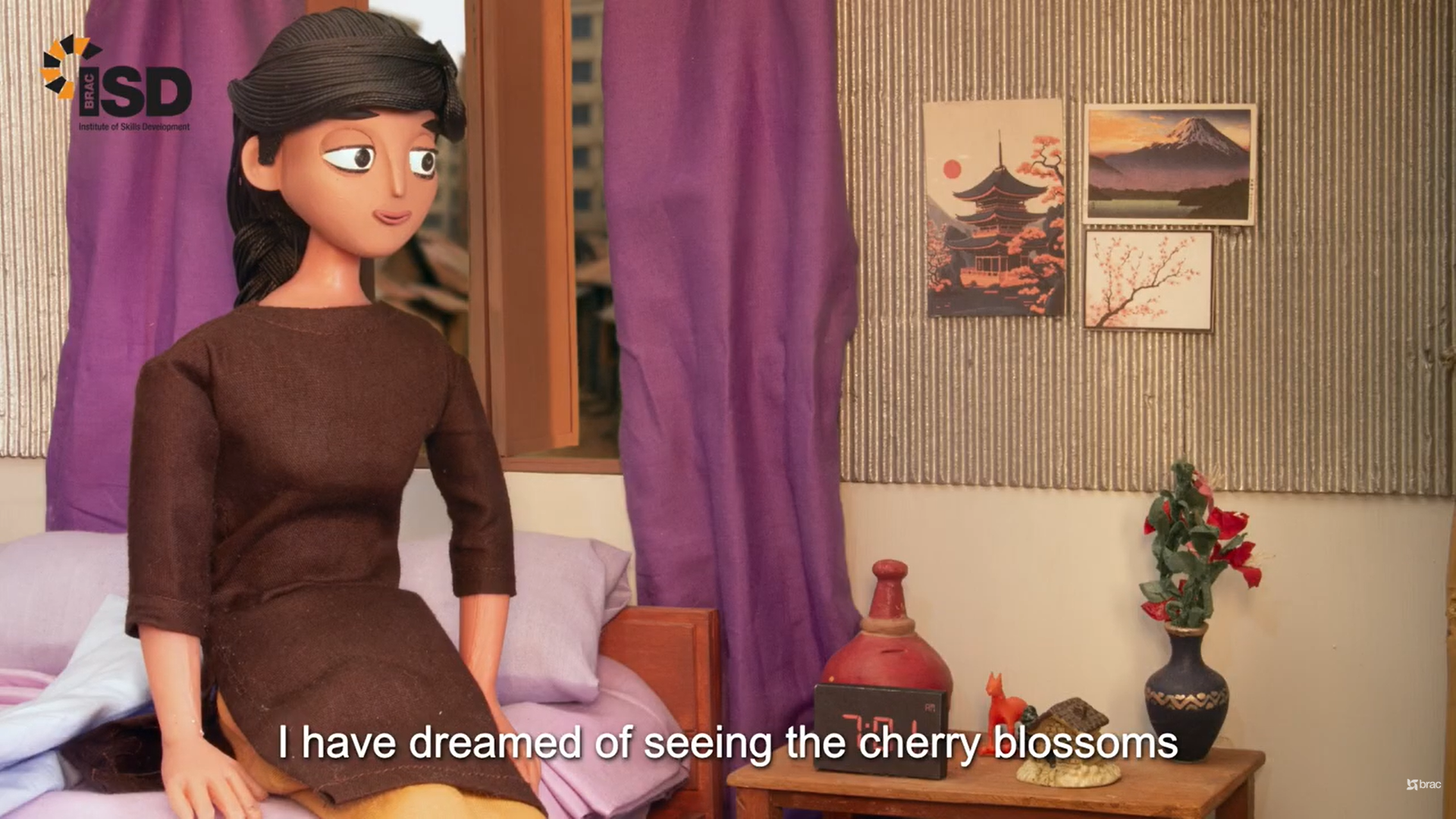 BRAC ISD stop-motion character dreams of seeing Japanese cherry blossoms while sitting inside her bedroom.