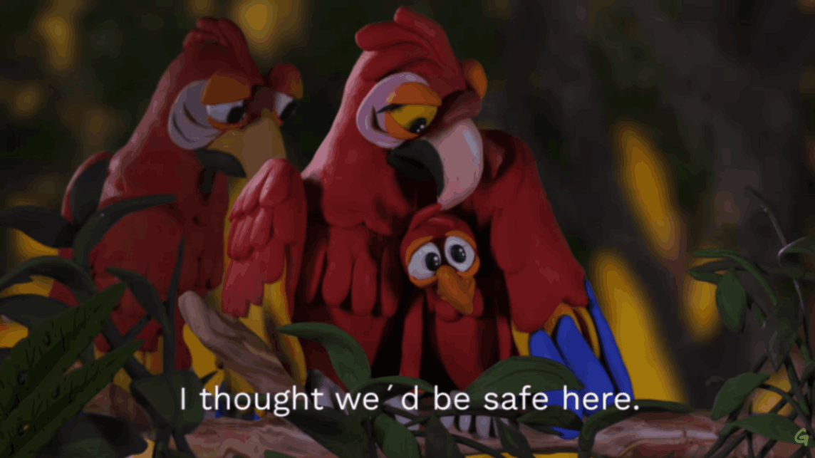 Macaw parents shield their chick while fire glows behind jungle leaves.