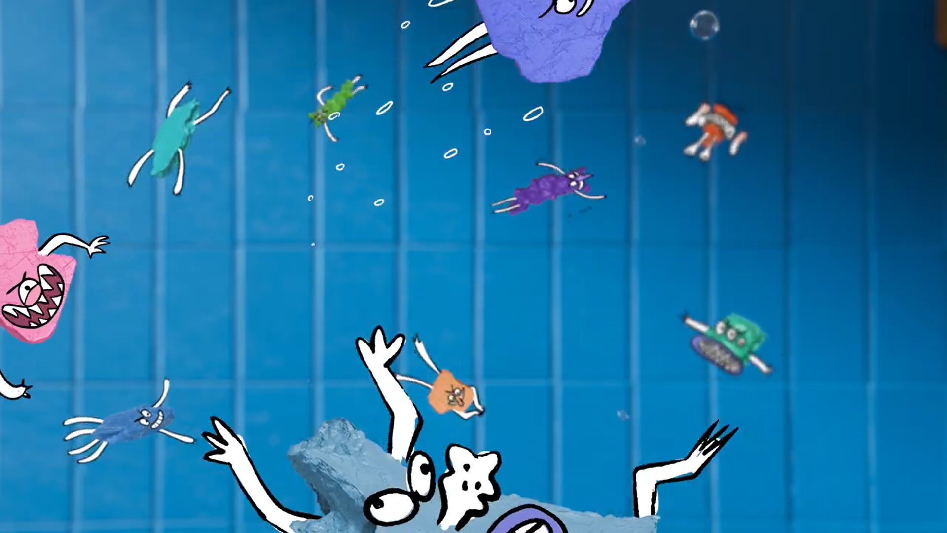 Colourful illustrated microplastic monsters float and tumble against a blue background.