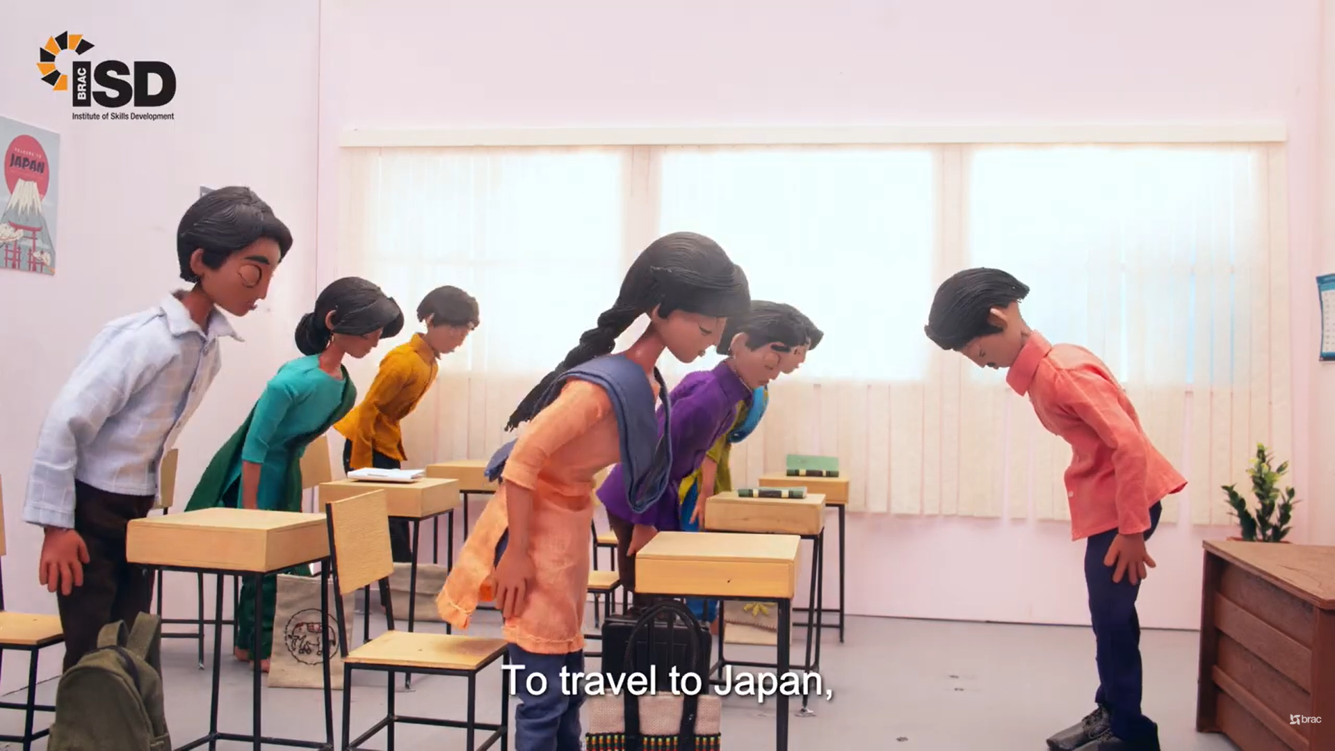 BRAC ISD stop-motion students bow respectfully toward their teacher inside a Japanese language classroom.