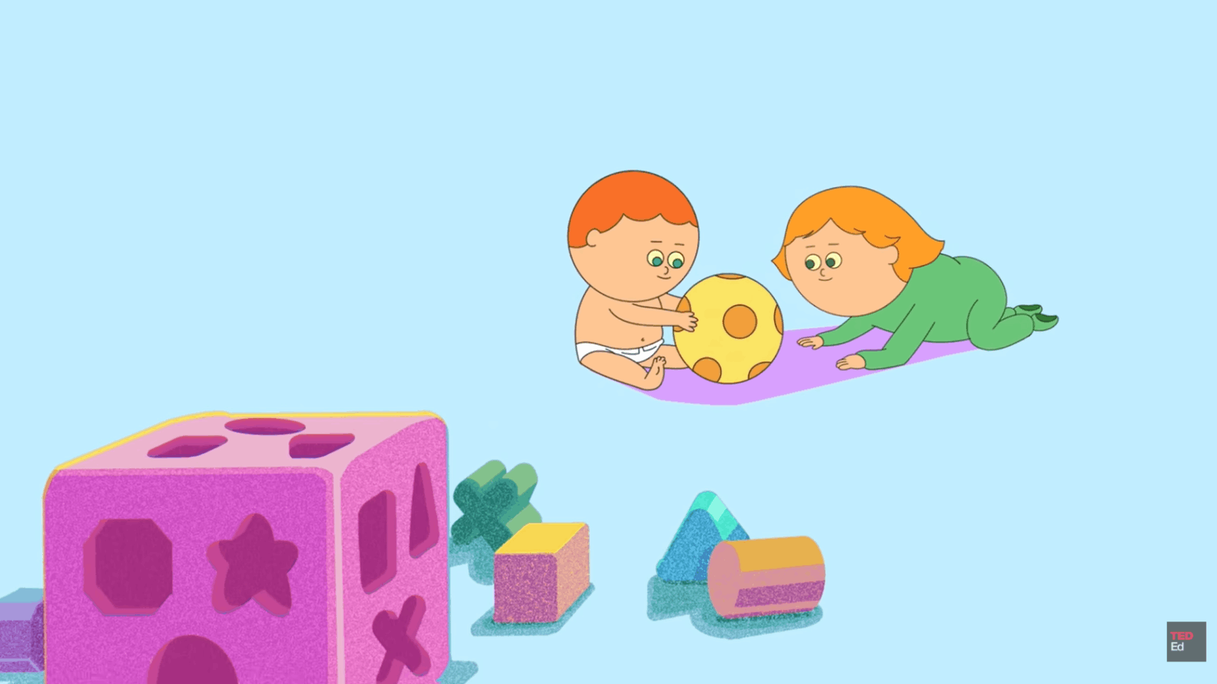 Two children playing with yellow ball beside toy blocks