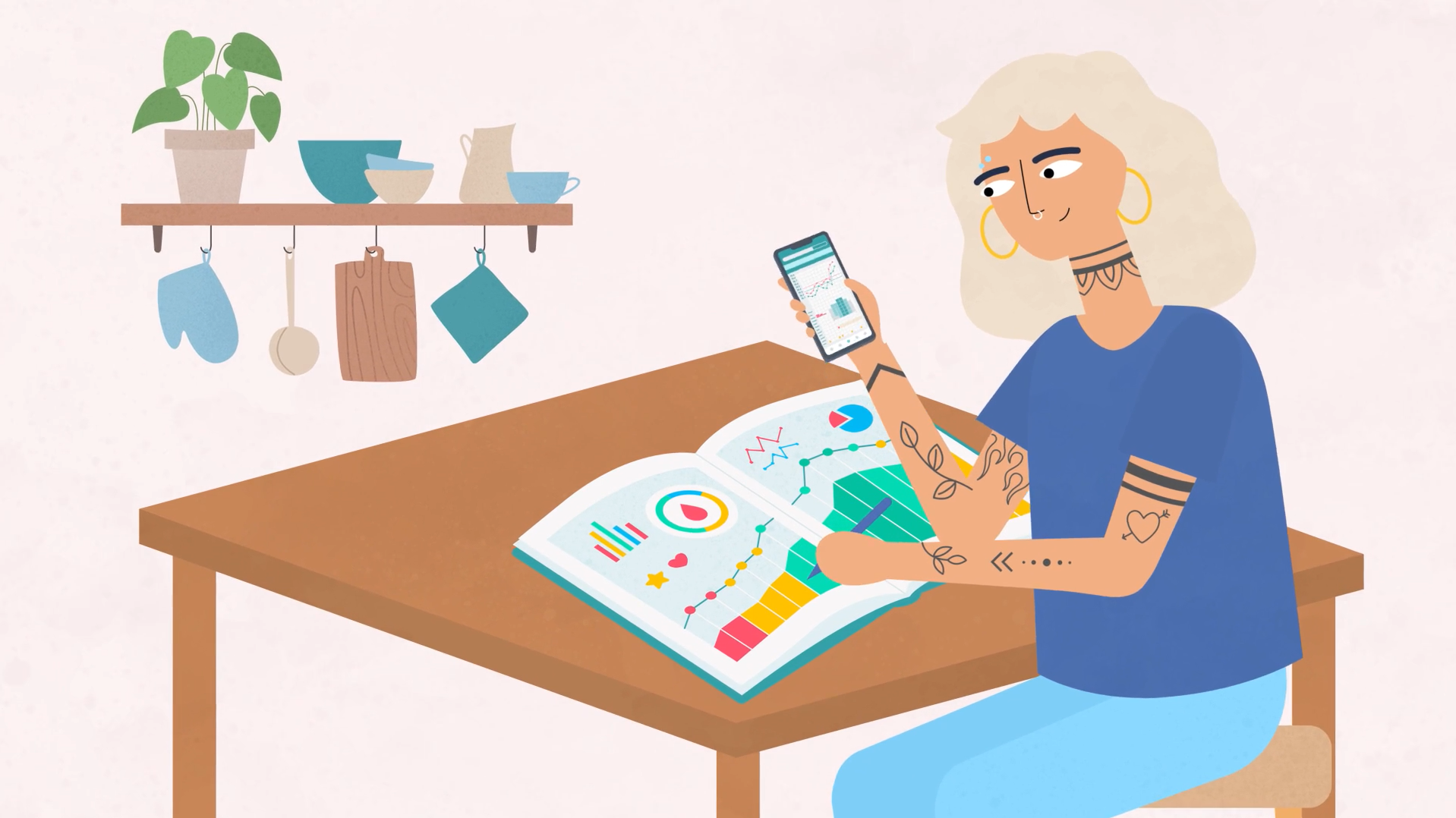 Woman reviews colourful charts in a notebook while checking additional health data on smartphone.