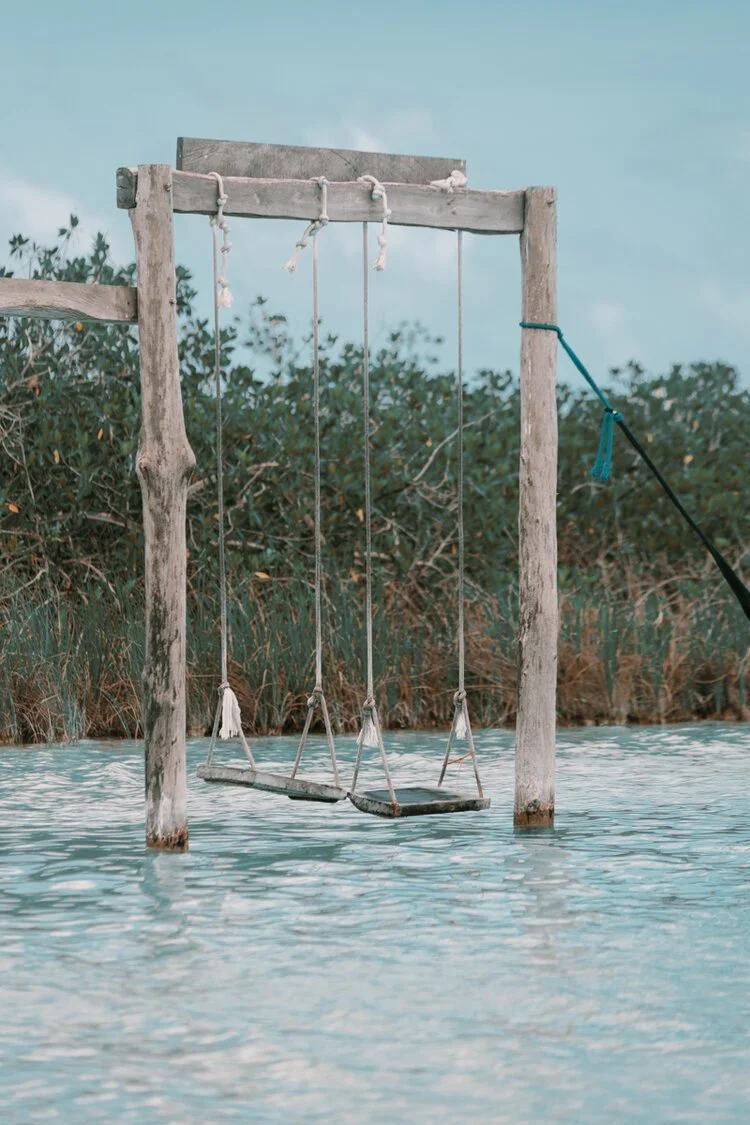 the swings at laguna kaan luum in tulum