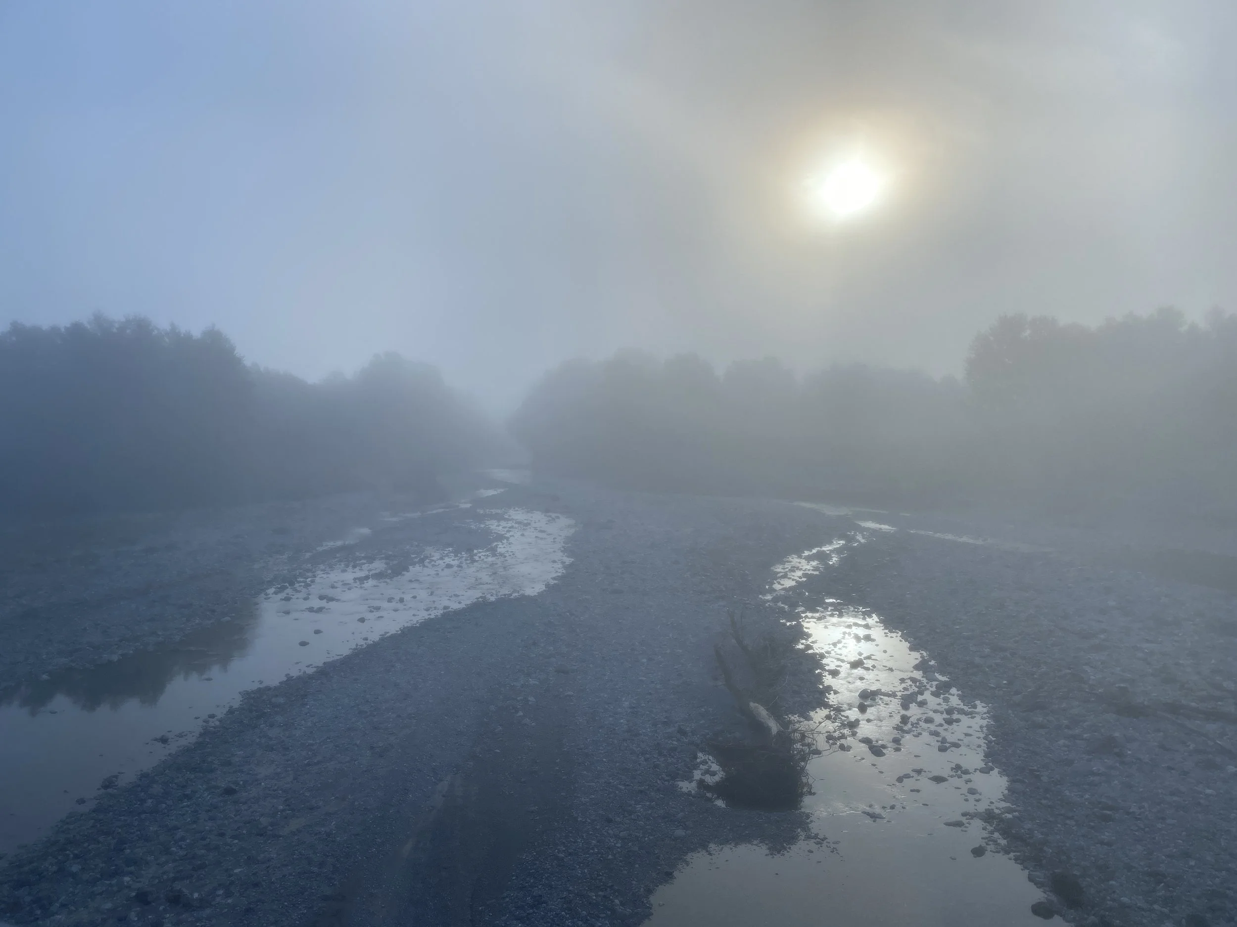The bottom of the valley at the river. Was cold here.