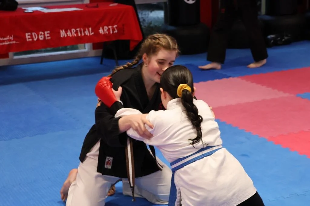 Aruna and Ivy wrestling.JPG