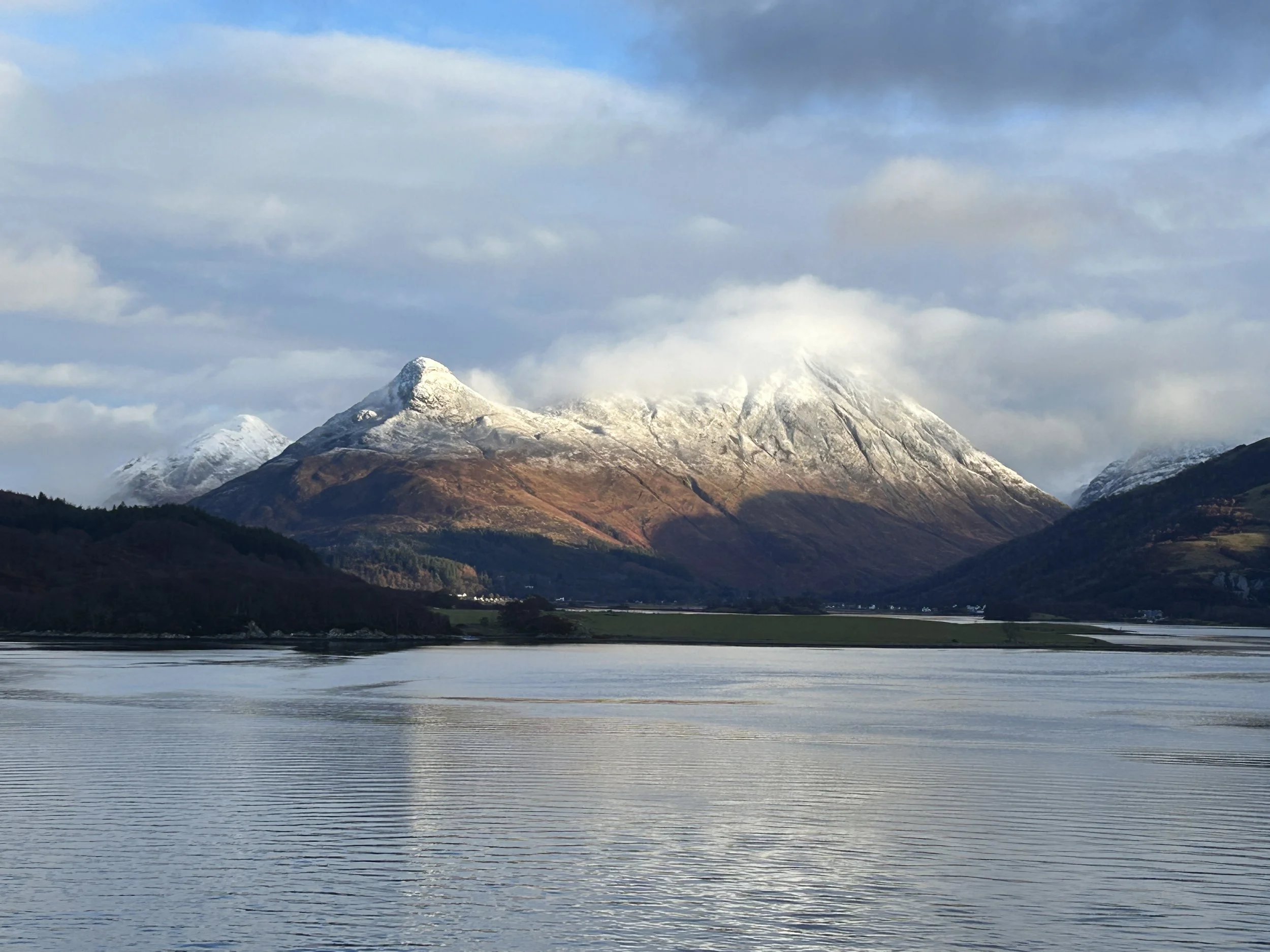 Snow-capped peaks of Glencoe during a Scottish winter photography trip.