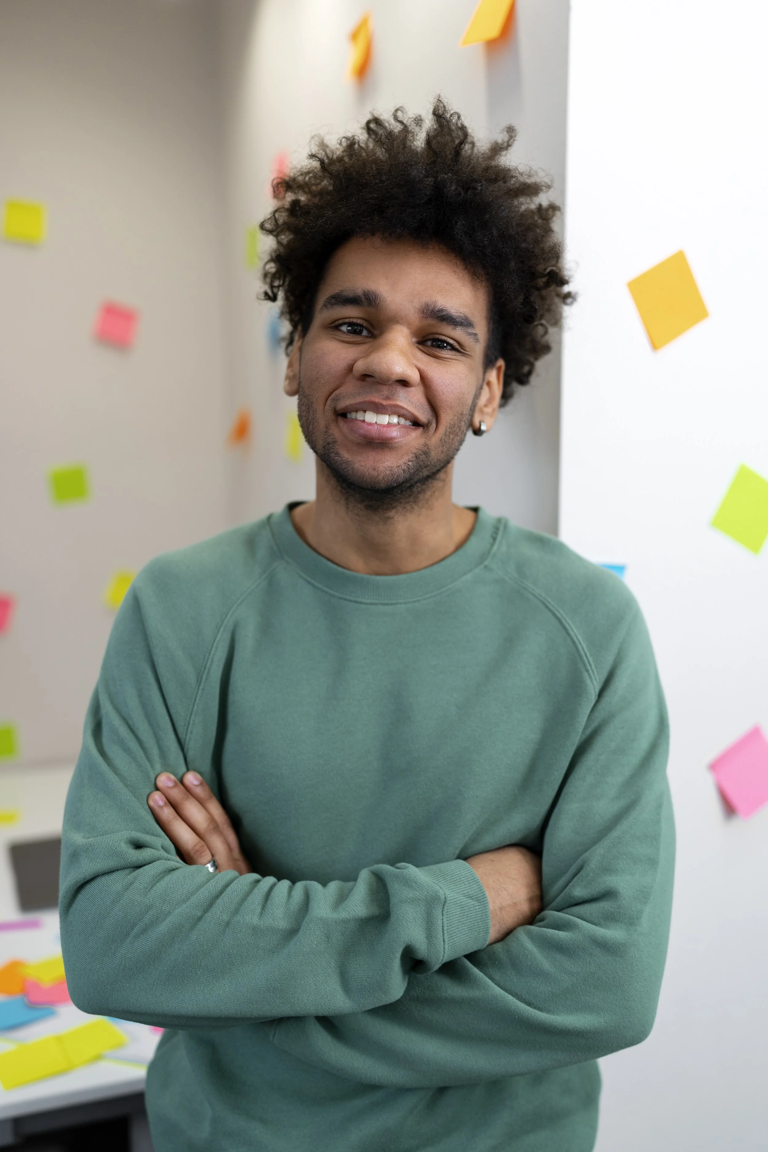 Smiling man in a workplace setting