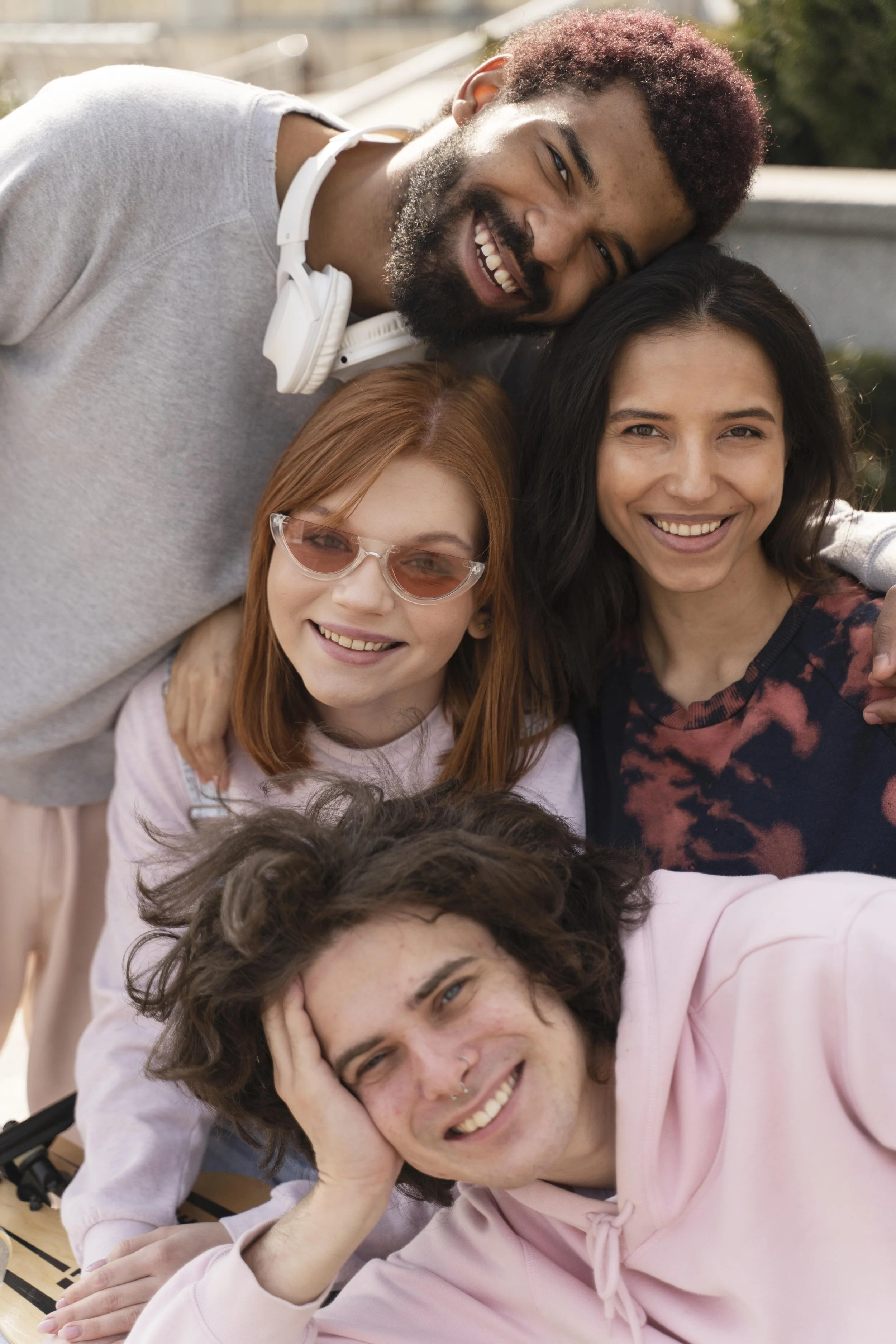 Group of friends smiling and posing for a photo