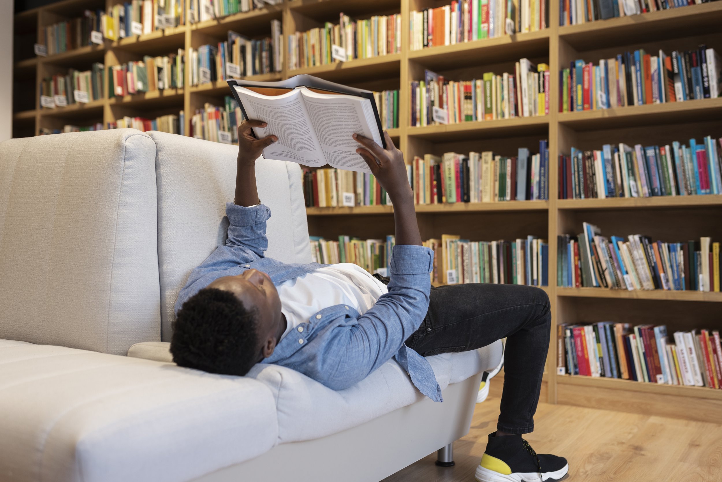 Young student studying in a library