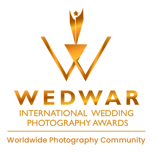 Golden logo with abstract design and embedded text, includes a website URL at the bottom.