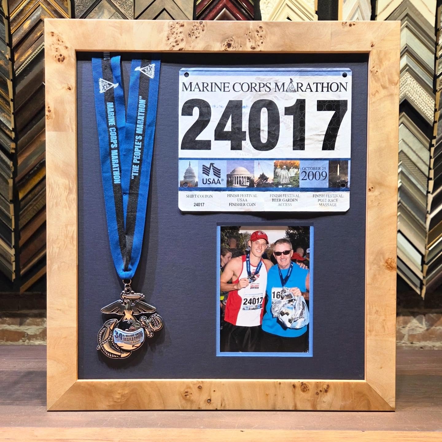 Marine Corp Marathon bib, medal and photo designed neatly into this burl veneer frame. One of many that we did for an office wall gallery. 

#custompictureframing #marinecorpsmarathon #marsthonrunner #burlvaneer #pictureframing