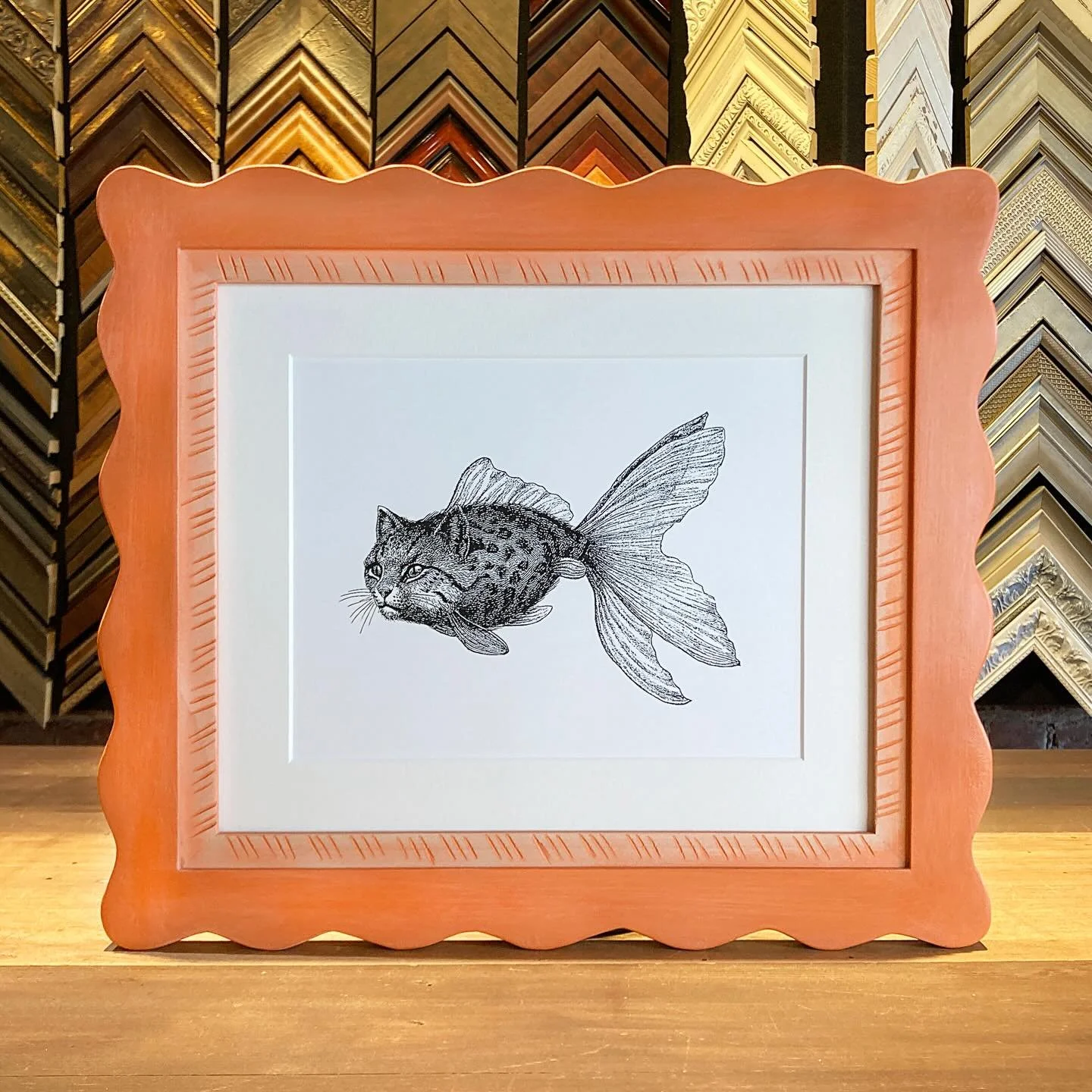 A fun little creative project for @cat07od and this @stockboydesigns catfish print. Bright, fun and the color of our logo, lol. Finished with @truvueglazing Optium Museum Acrylic. 

#stockboydesigns #catfish #funframe #handmadeframe #optiumacrylic