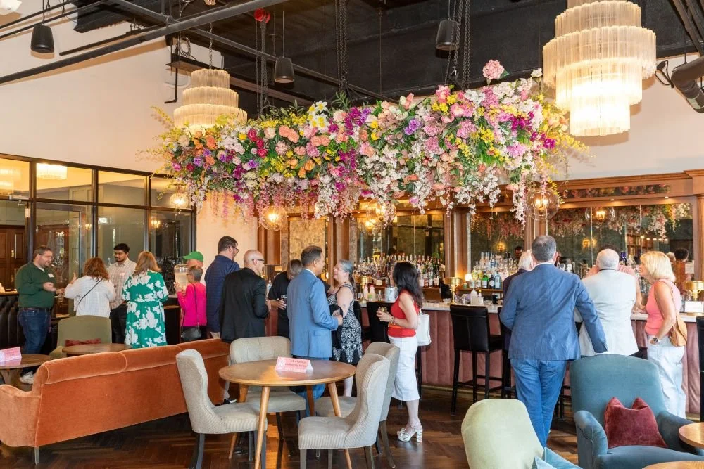 The August 18 event at Fueled Collective brought together 22 chapter presidents and guests for an evening of Conversations & Connection.