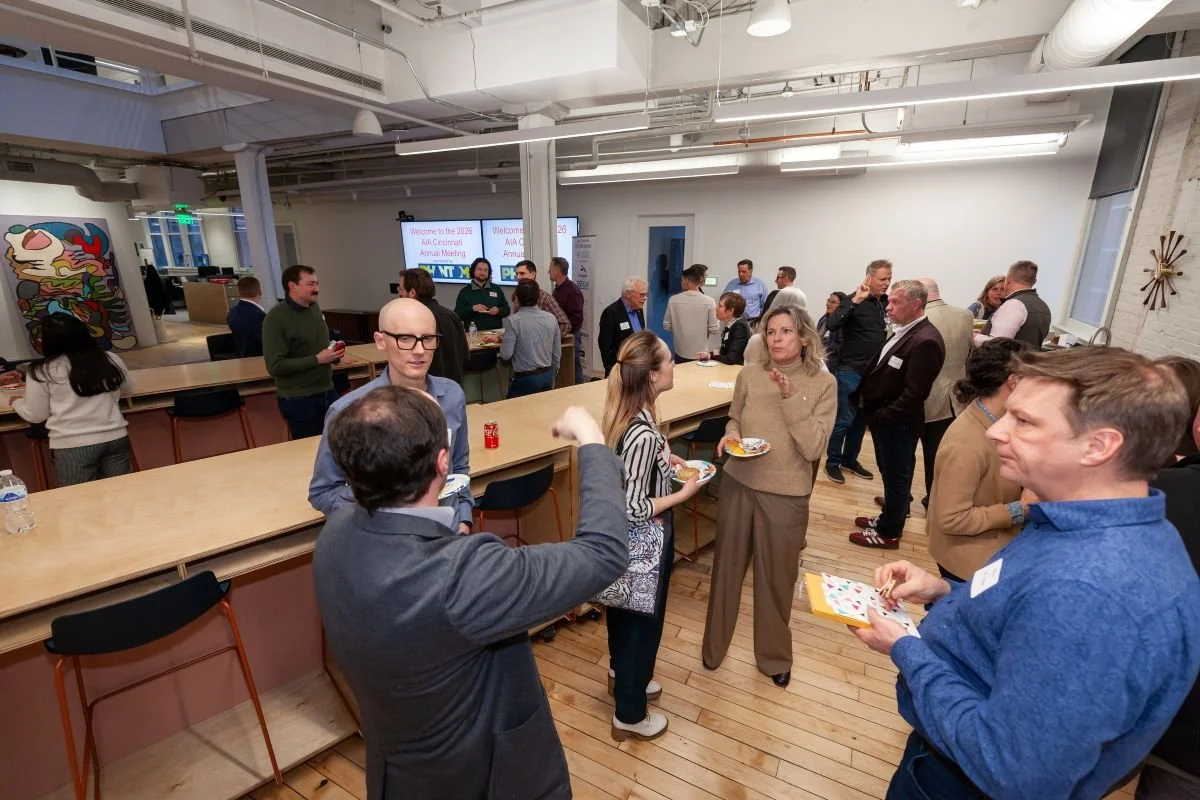 AIA Cincinnati members and friends connect after the program. Ryan O'Malley, Tim Nolan, and Nathan Meyers in foreground.