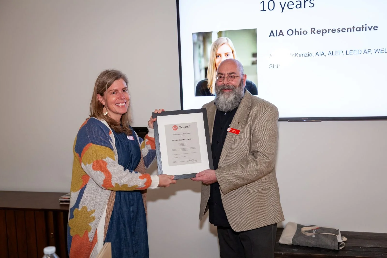 Allison McKenzie, AIA recognized for 10 years of board service by Paul Shirley, 