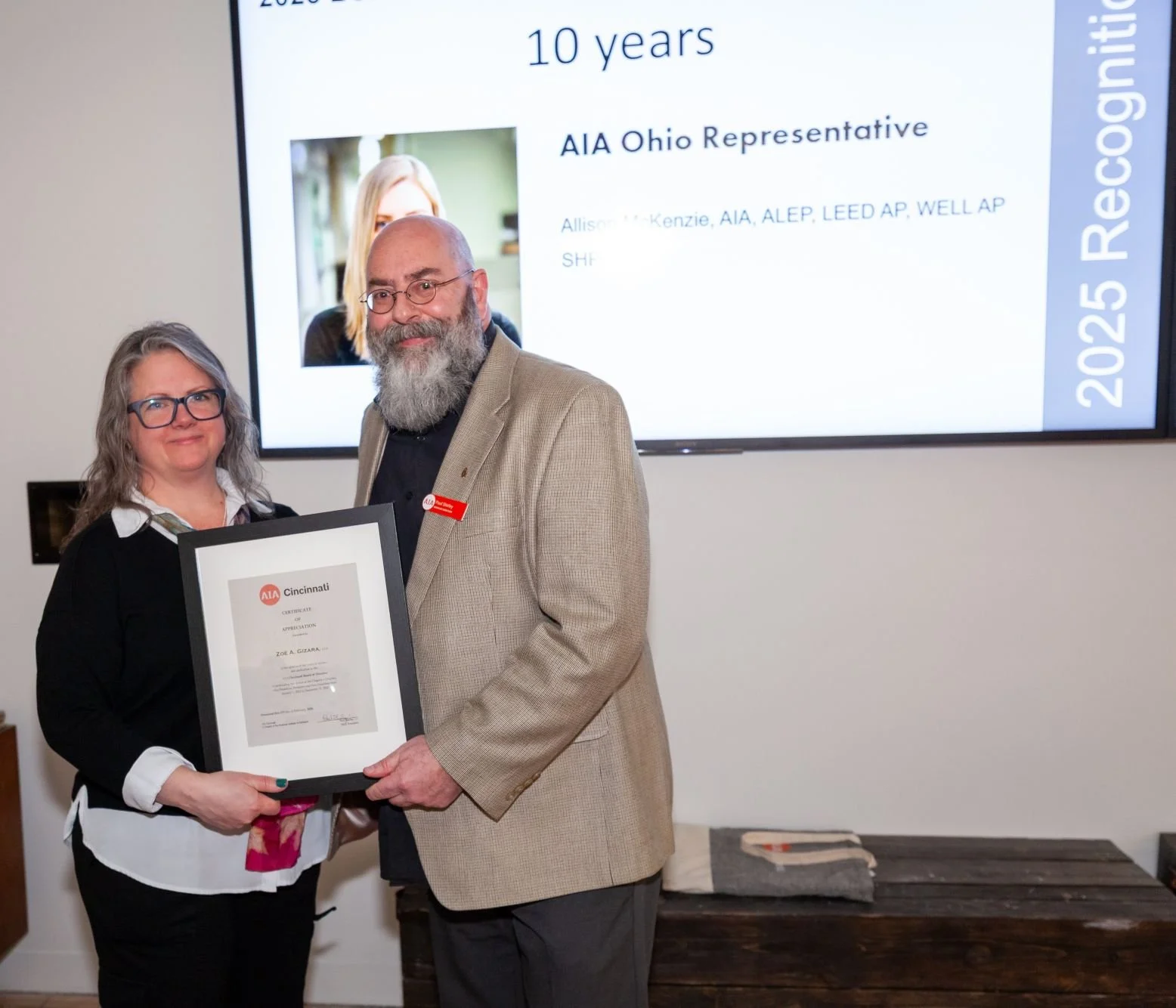 Zoe Gizara, AIA recognized for 5 years of board service by Paul Shirley.
