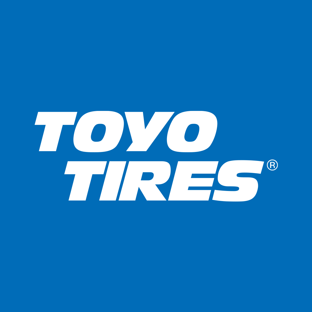 Blue background with white text displaying the Toyo Tires logo.