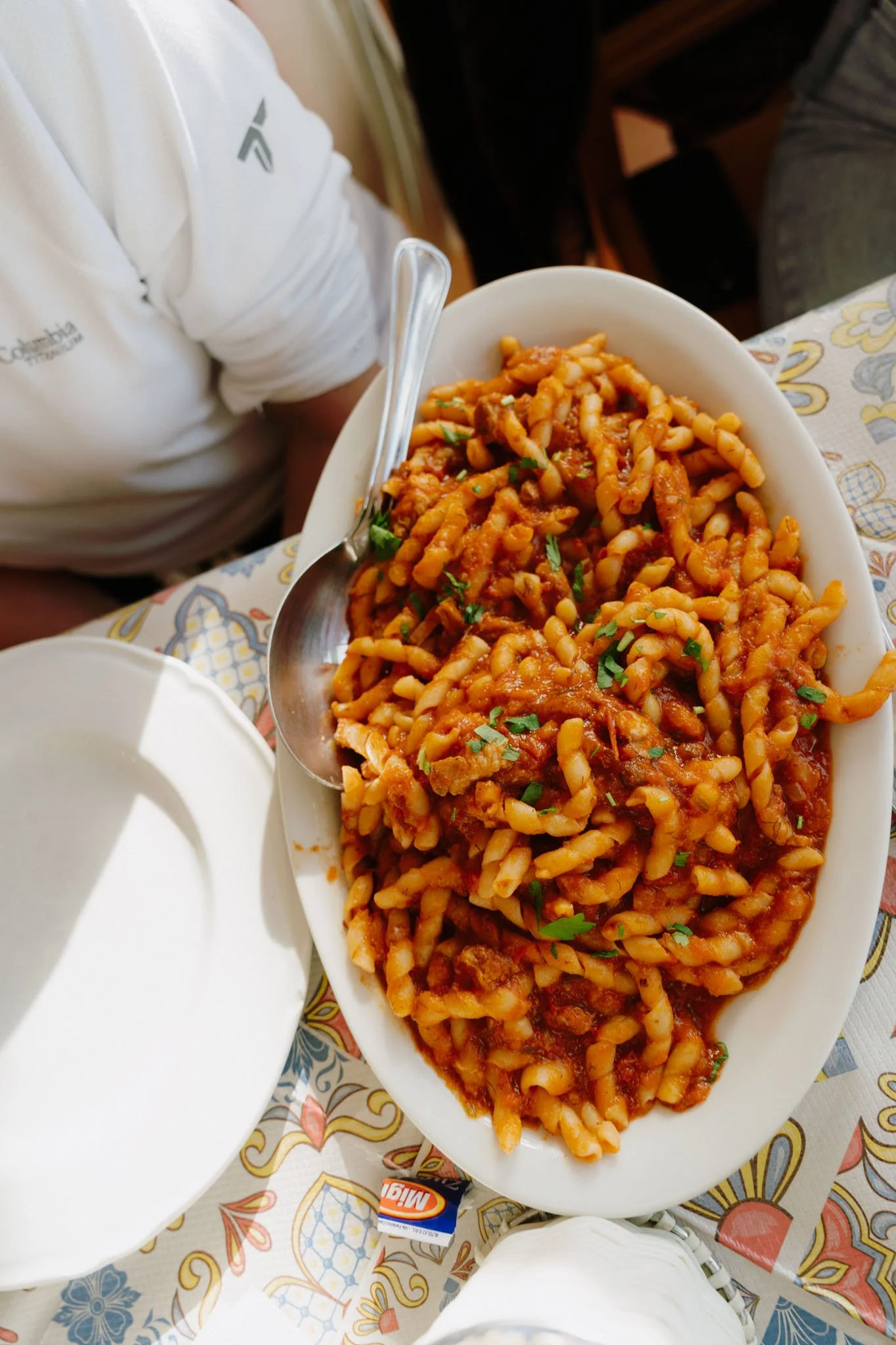 Eating the traditional Sicilian pasta