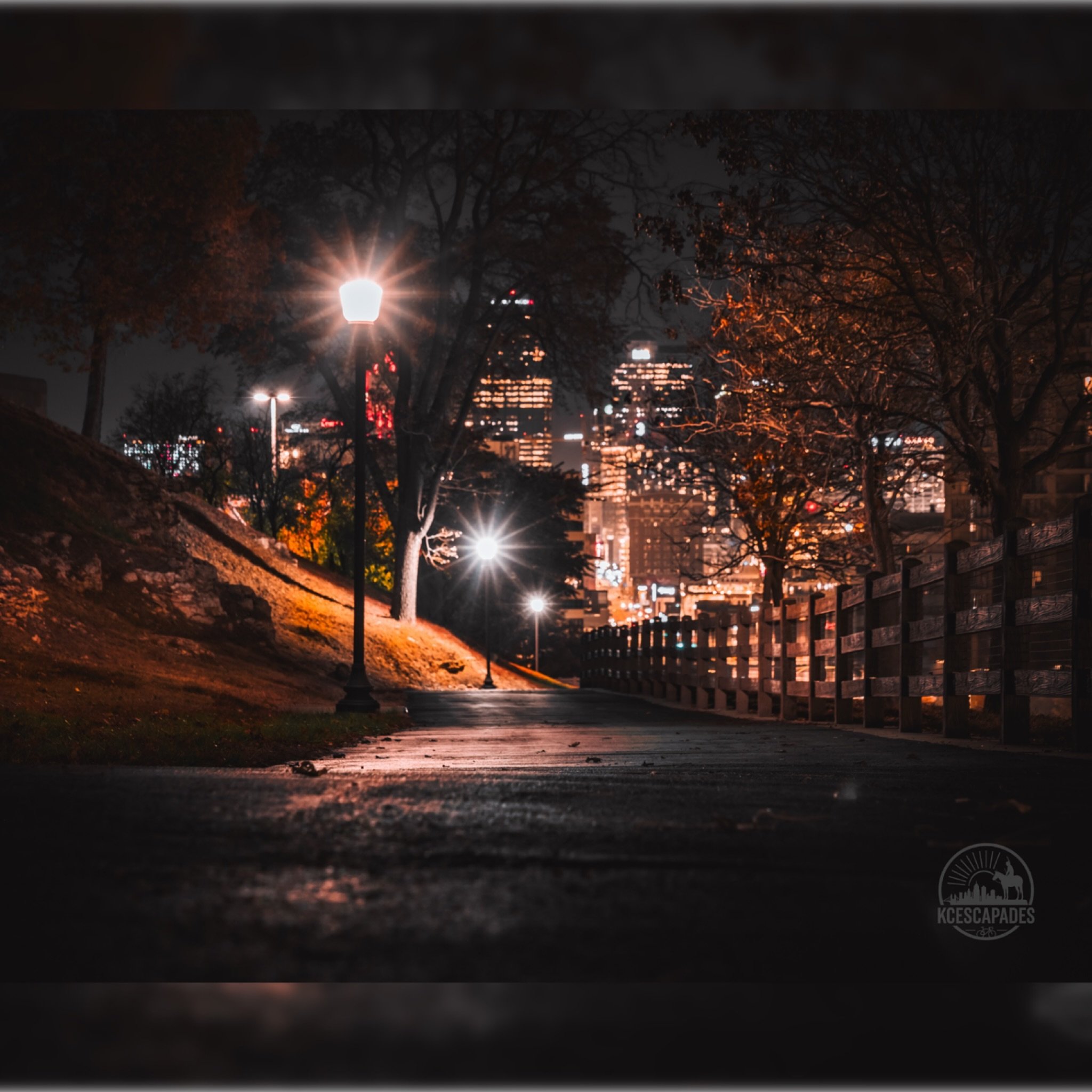 Stillness hits different at night. Caught this view on a walk through KC&mdash;streetlights glowing, the path quiet, and the skyline shining in the distance. There&rsquo;s something about the city after dark.

Kansas City, always showing off. ✨🌃
#Ka