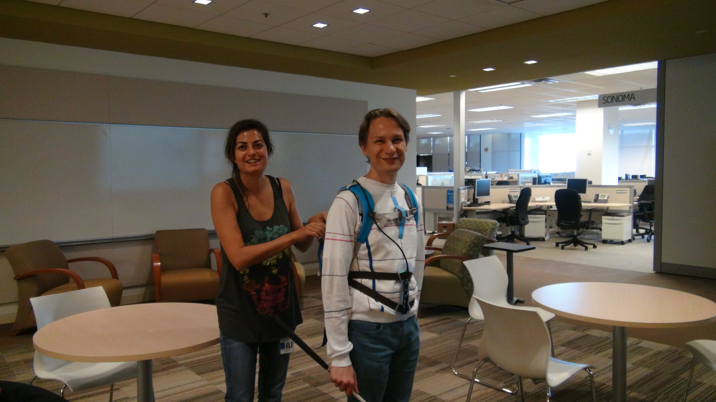 Shani and the volunteer testing the initial device