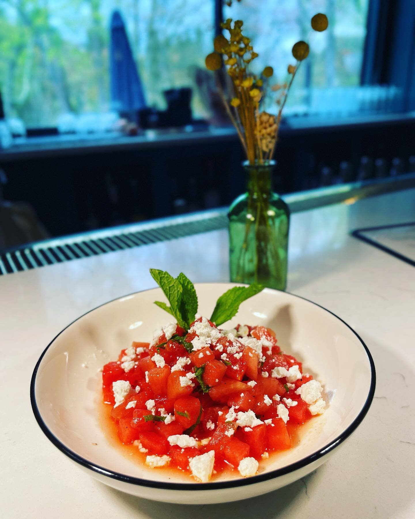 Summer is almost here and that means new menu items. Say hello to your Watermelon Salad. 

Chunks of sweet, local watermelon are combined with fresh mint from our garden, Bulgarian sheep's milk feta (or vegan feta) and tossed with our house lemon oli