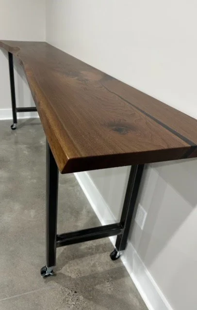Black Walnut 10ft Long mobile Countertop with Black Epoxy void fills on steel