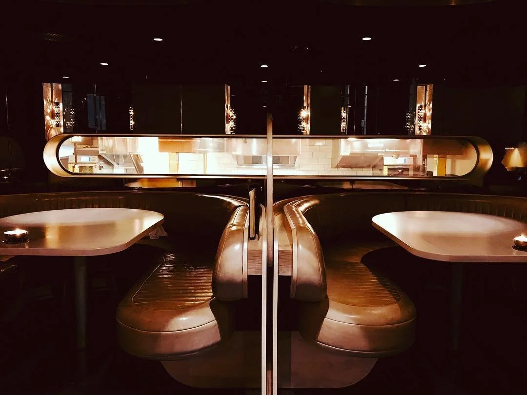 Leather booth seating at Elchi in evening light