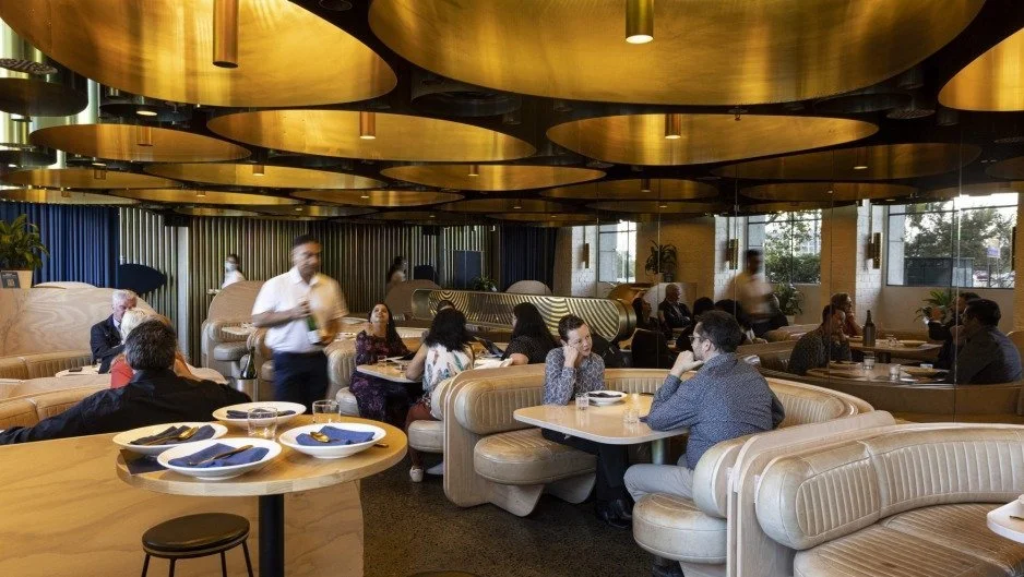 Guests dining at Elchi under the gold ceiling