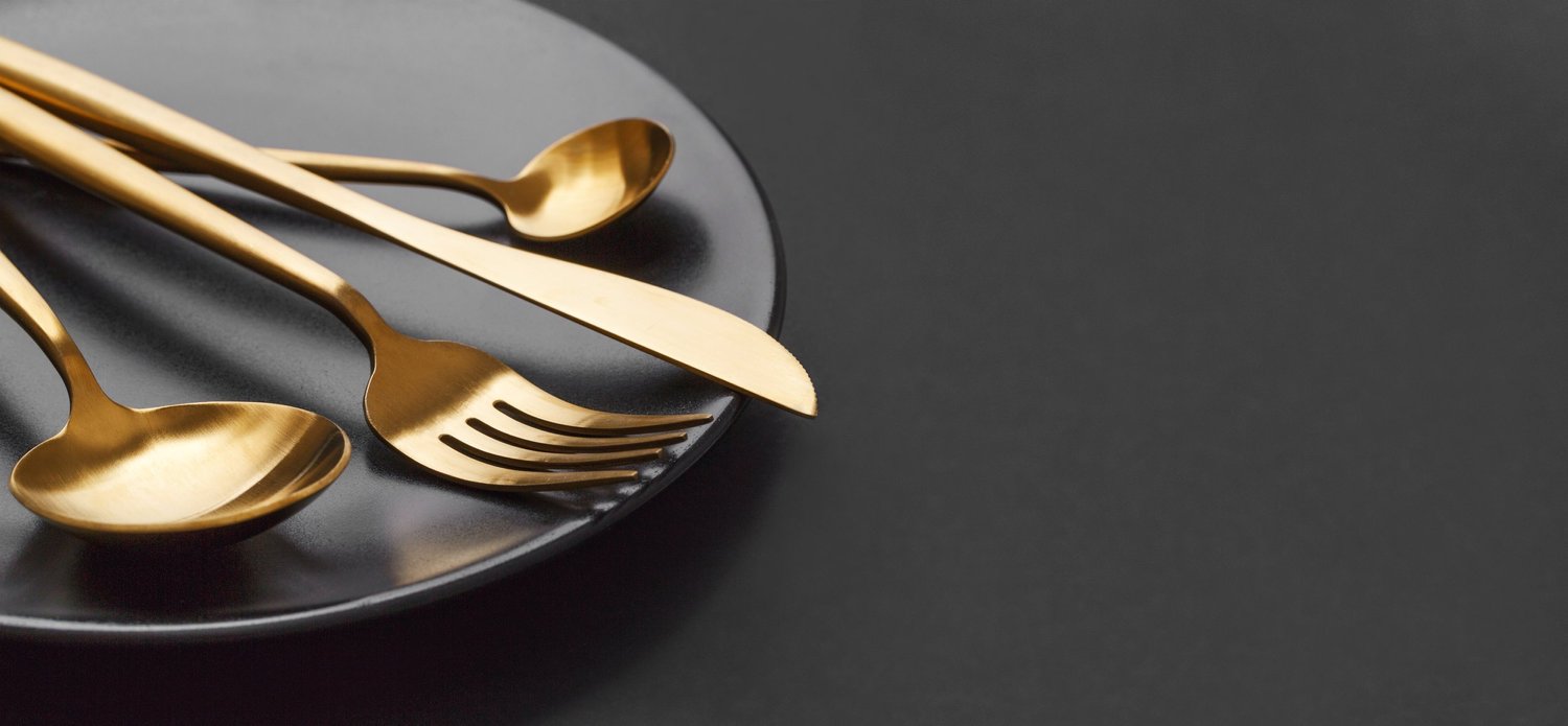 Gold cutlery for an Elchi catered event