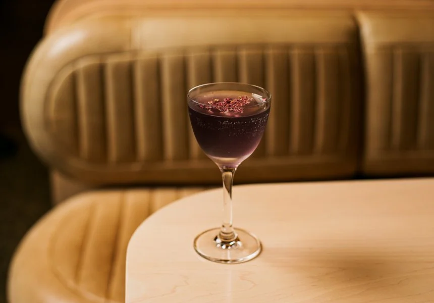 A glass of red wine in an Elchi booth