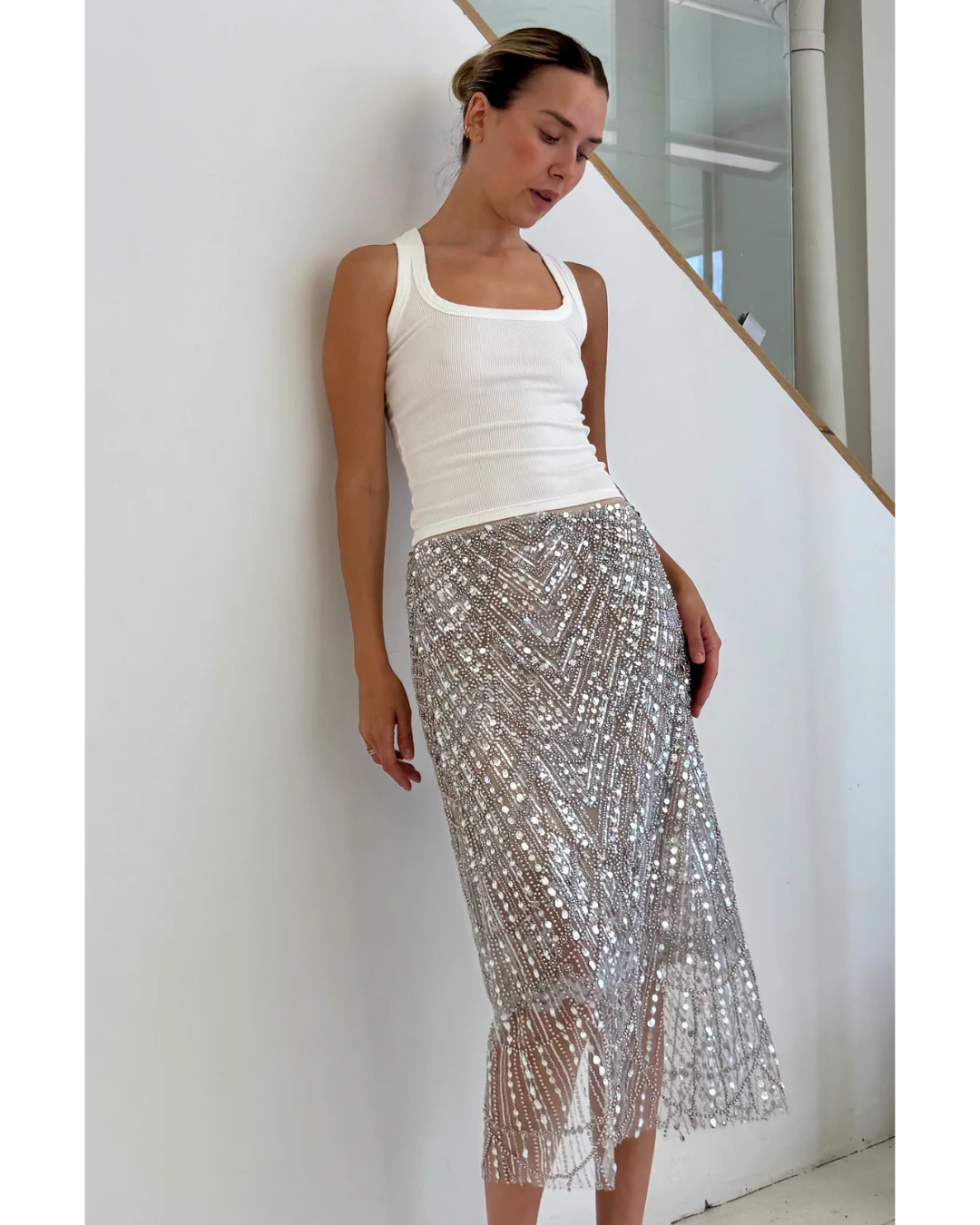 Sparkly skirt with a white tank