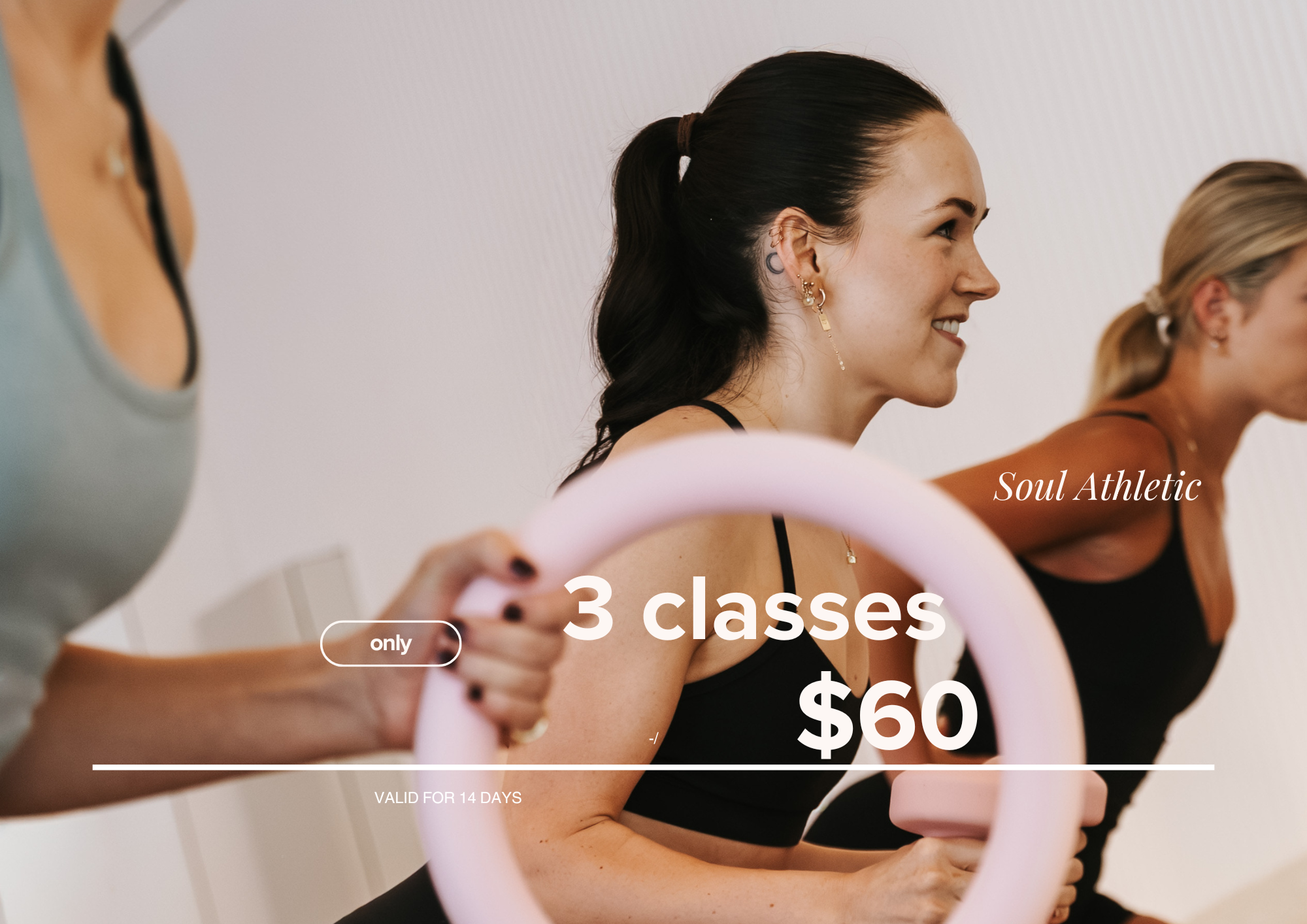Women participating in a fitness class, holding pink exercise rings, smiling and engaging in workout, with text overlay promoting '3 classes for $60' and 'Soul Athletic', valid for 14 days.