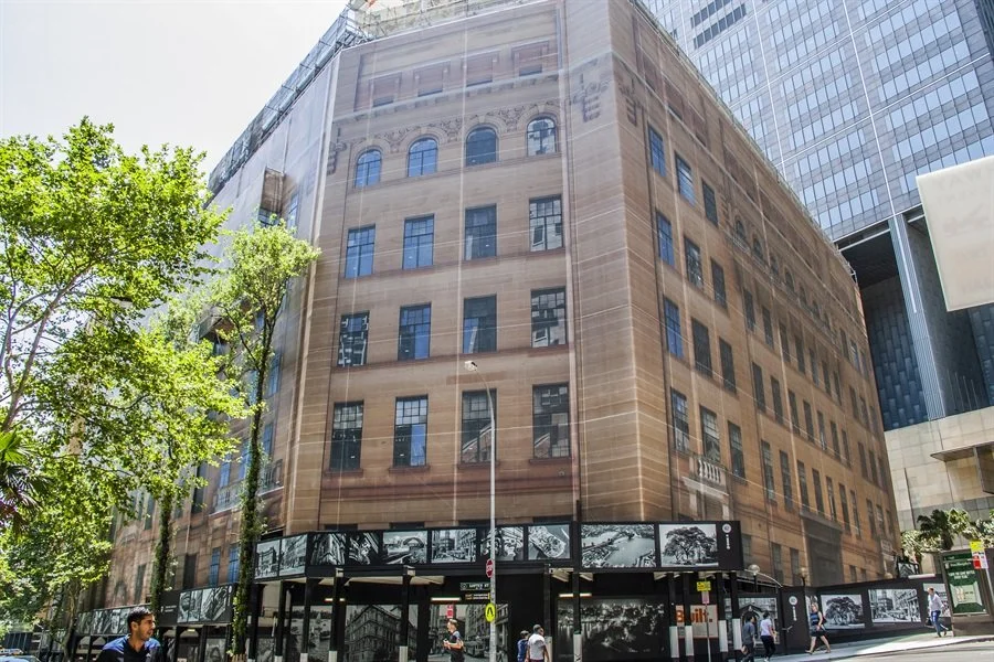 Building Wraps & Exterior Signage — Scaffad