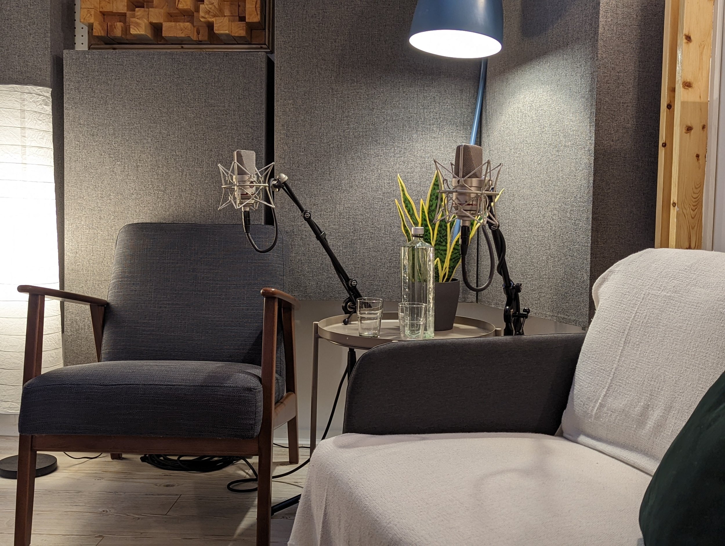 Lightship 95 East London podcast set with armchairs, microphones and acoustic treatment