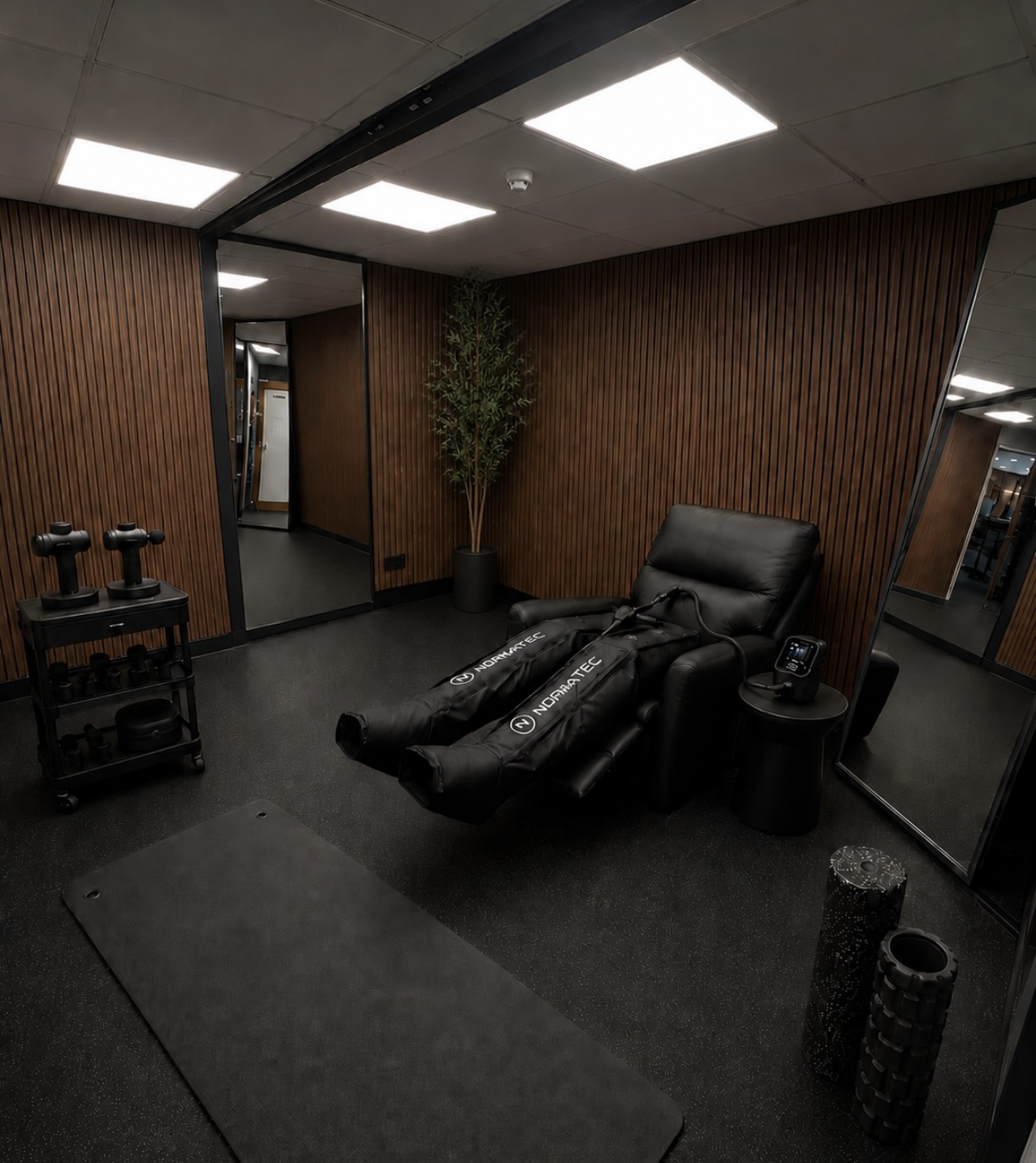 compression boots, massage gun and foam rolling stack house gym rayleigh