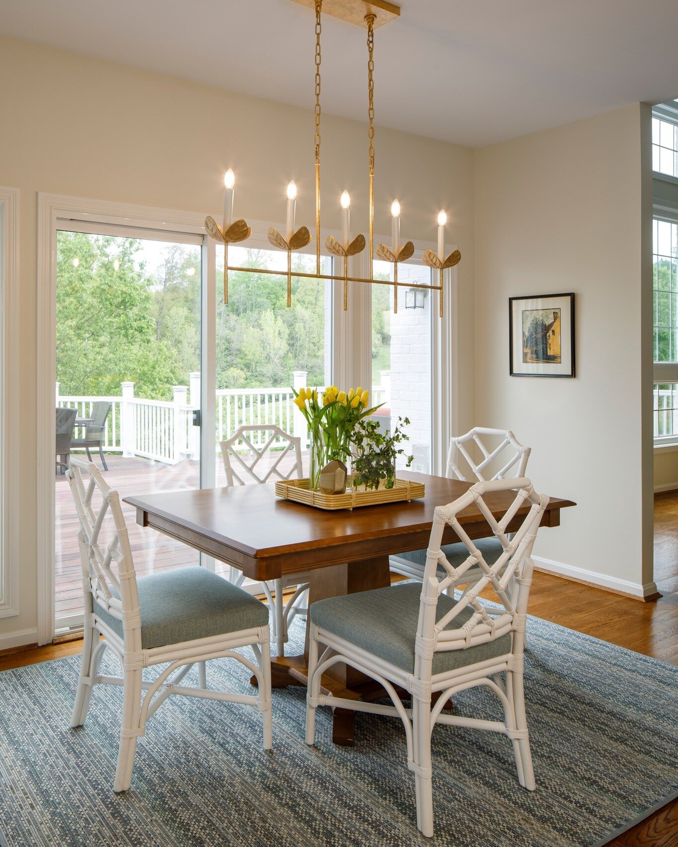 Chippendale chairs, meet Julie Neill for @visualcomfort! How cute is this kitchen table/breakfast room? #Chippendale We did a family-friendly COM fabric on these PALECEK chairs and used an indoor/outdoor rug that makes cleaning a breeze. #SpringDesig