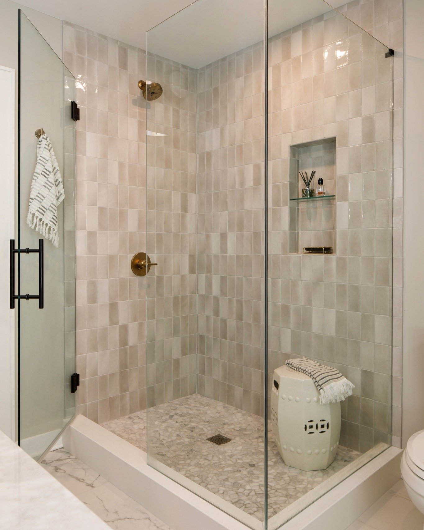 Ann thinks of everything! This ceramic garden stool is an makes an unconventional yet very practical seat in this gorgeous shower. Swipe to check out the before! #GardenStool

#interiordesign #shower #hydeparkohio #cincinnati #ohio #cincygram #design