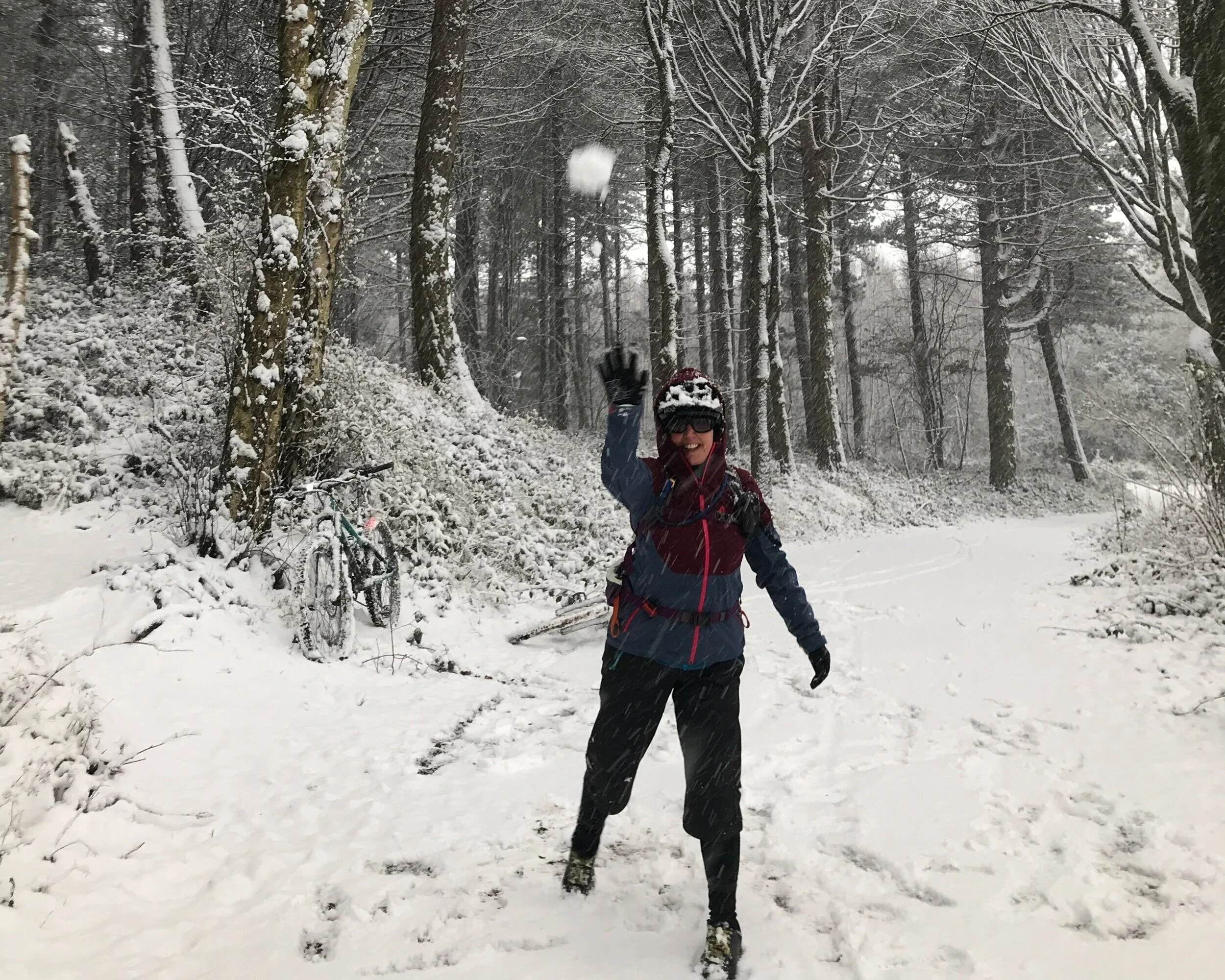 Throwing a snowball in West Yorkshire woodland