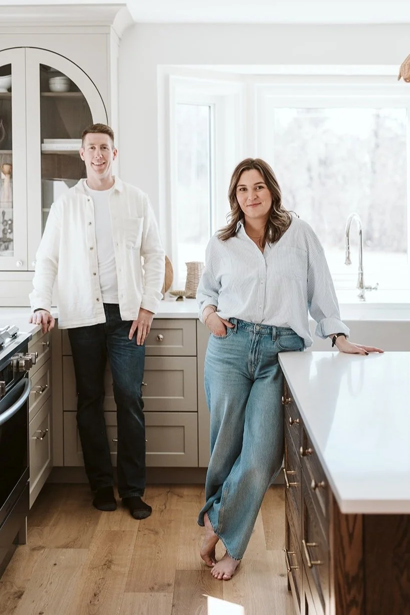Park Road Design & Build owners Monique & Andrew standing in a newly renovated kitchen in a Northumberland County farmhouse.