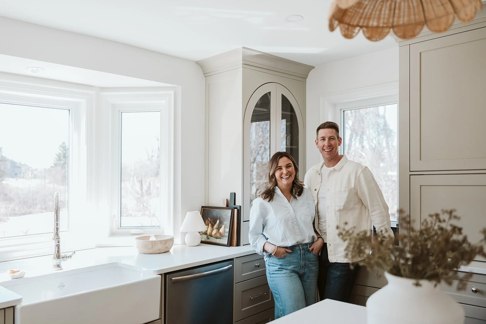 Park Road Design & Build owners Monique & Andrew standing in a newly renovated kitchen in a Northumberland County farm house..