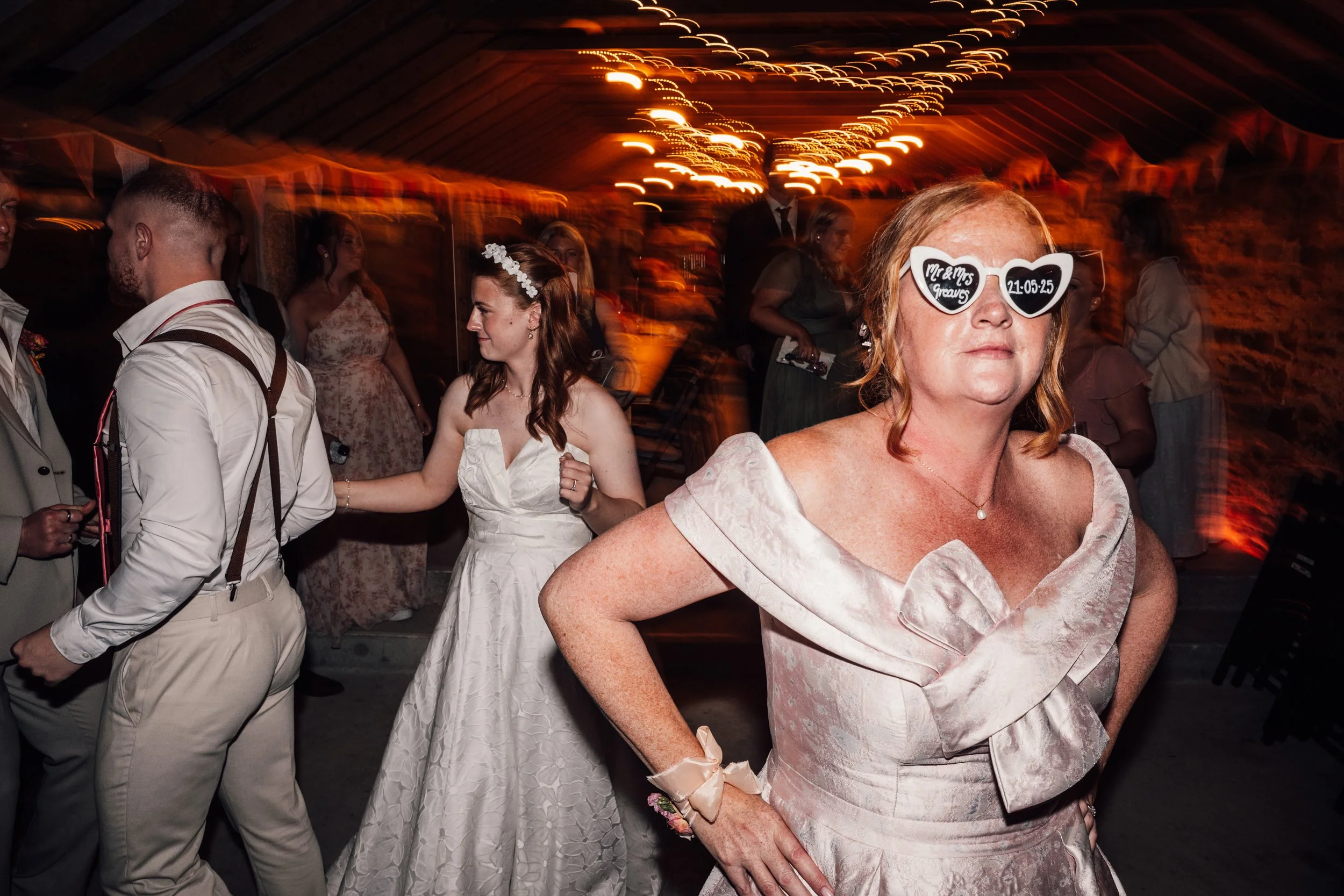 shutter drag flash on dancefloor at Cornwall wedding