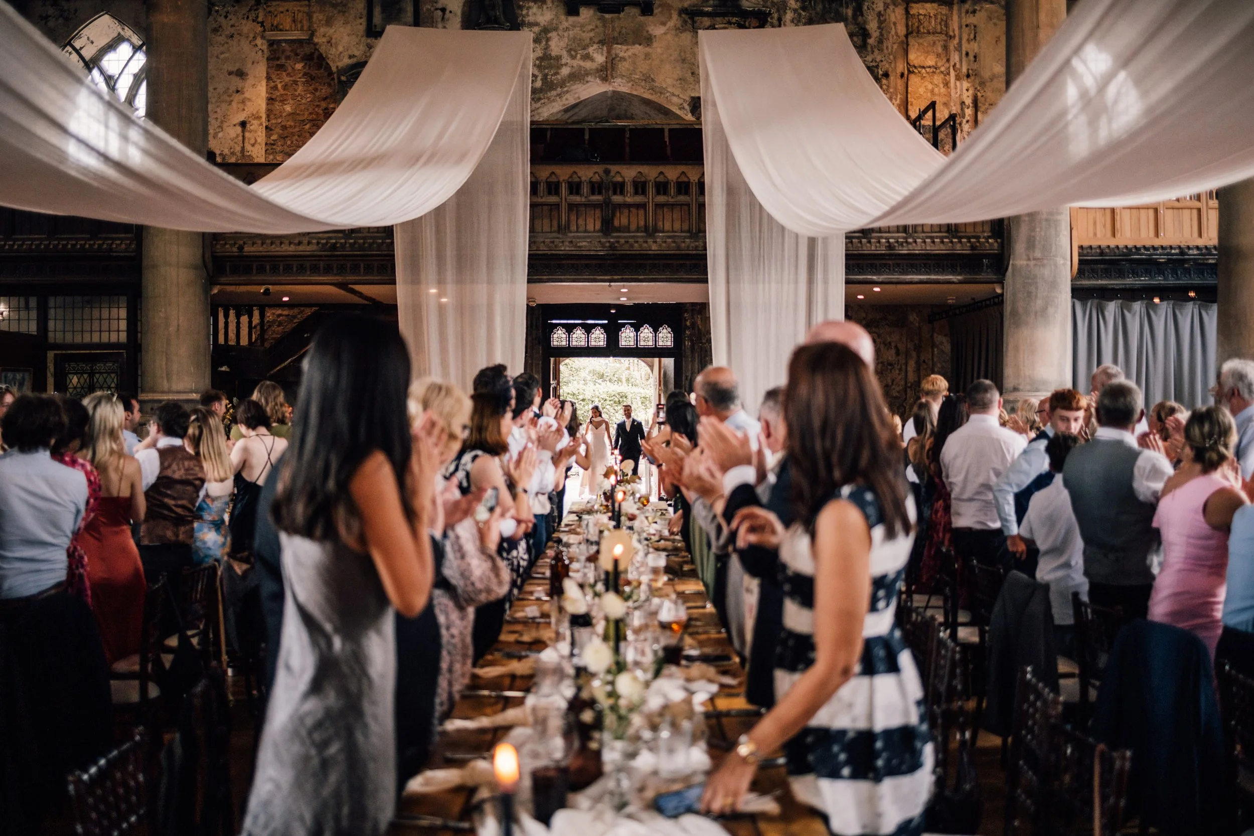 Bride and groom entering reception space at The Mount Without Bristol