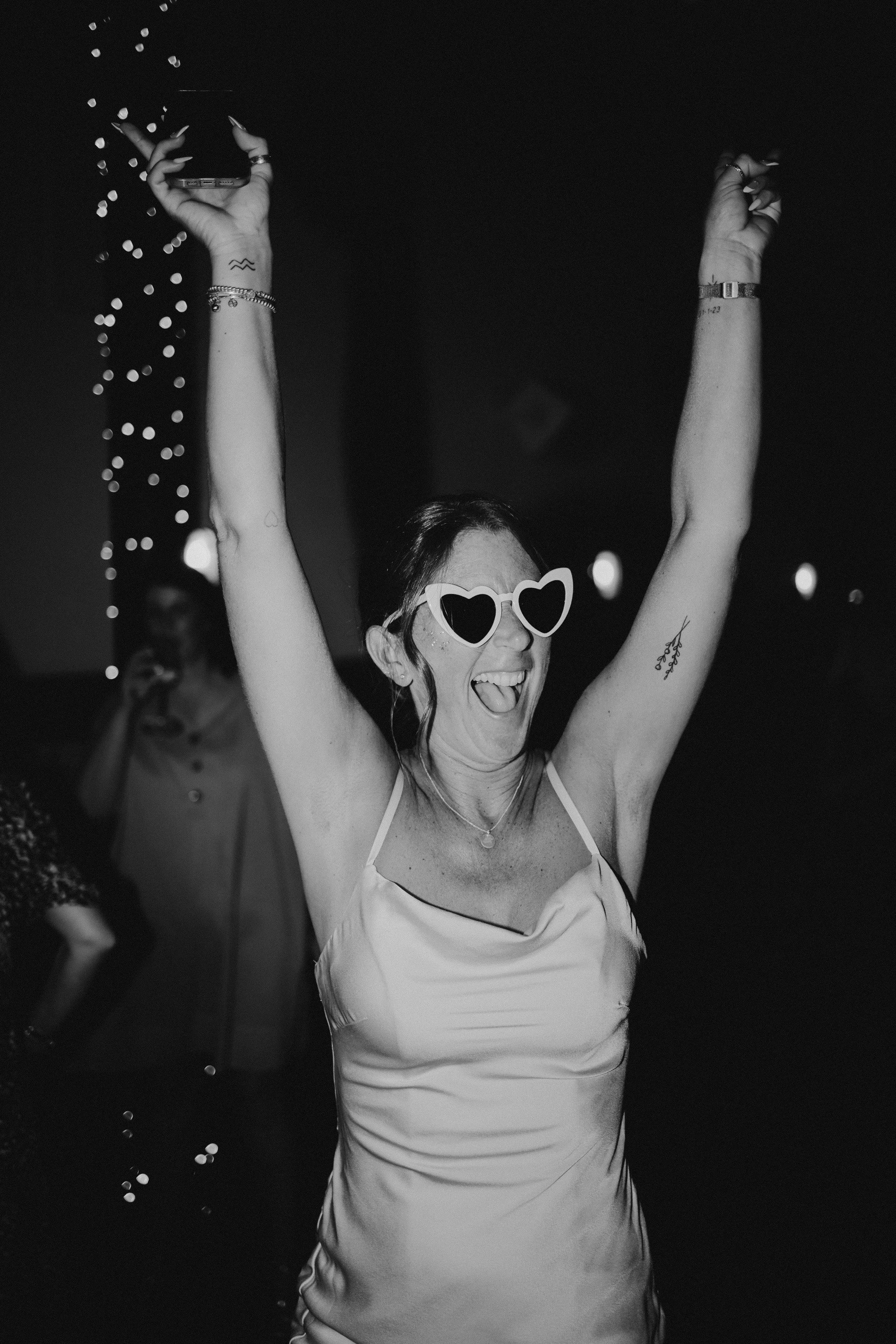 Wedding guests captured candidly enjoying the celebration