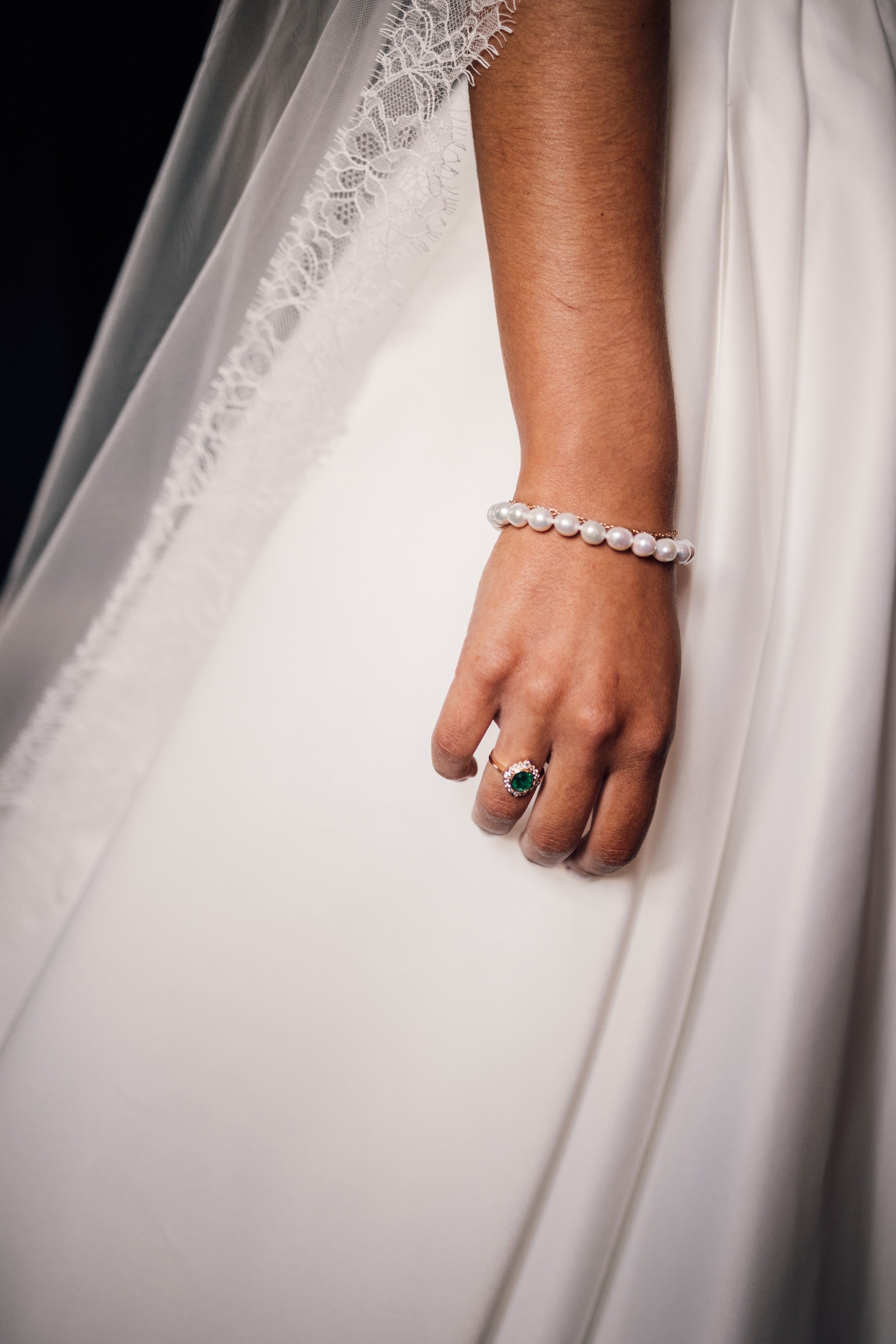 Bridal lace and jewellery details at Peak District wedding in august