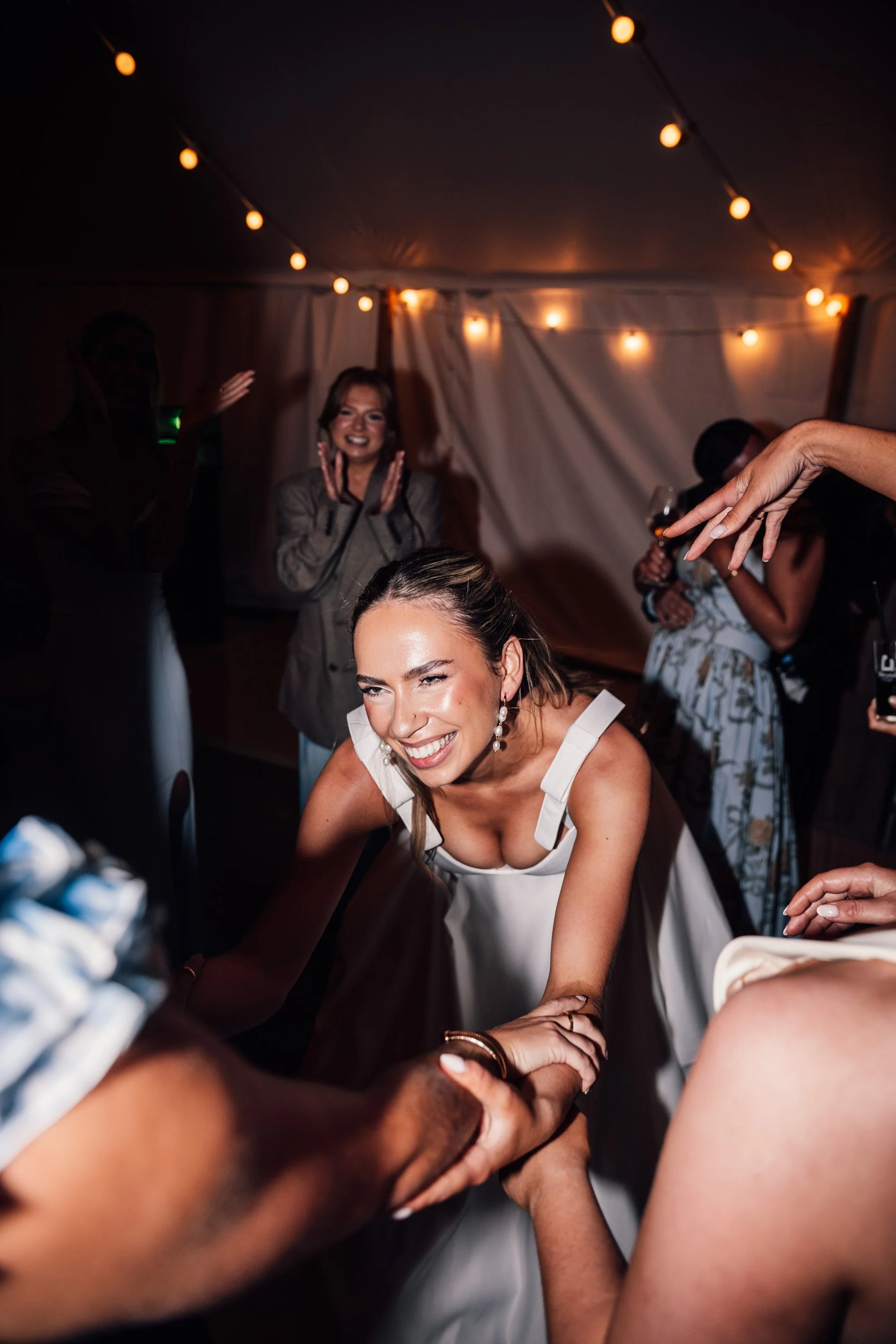 Direct flash photography of bride on the dancefloor at her Peak District summer wedding