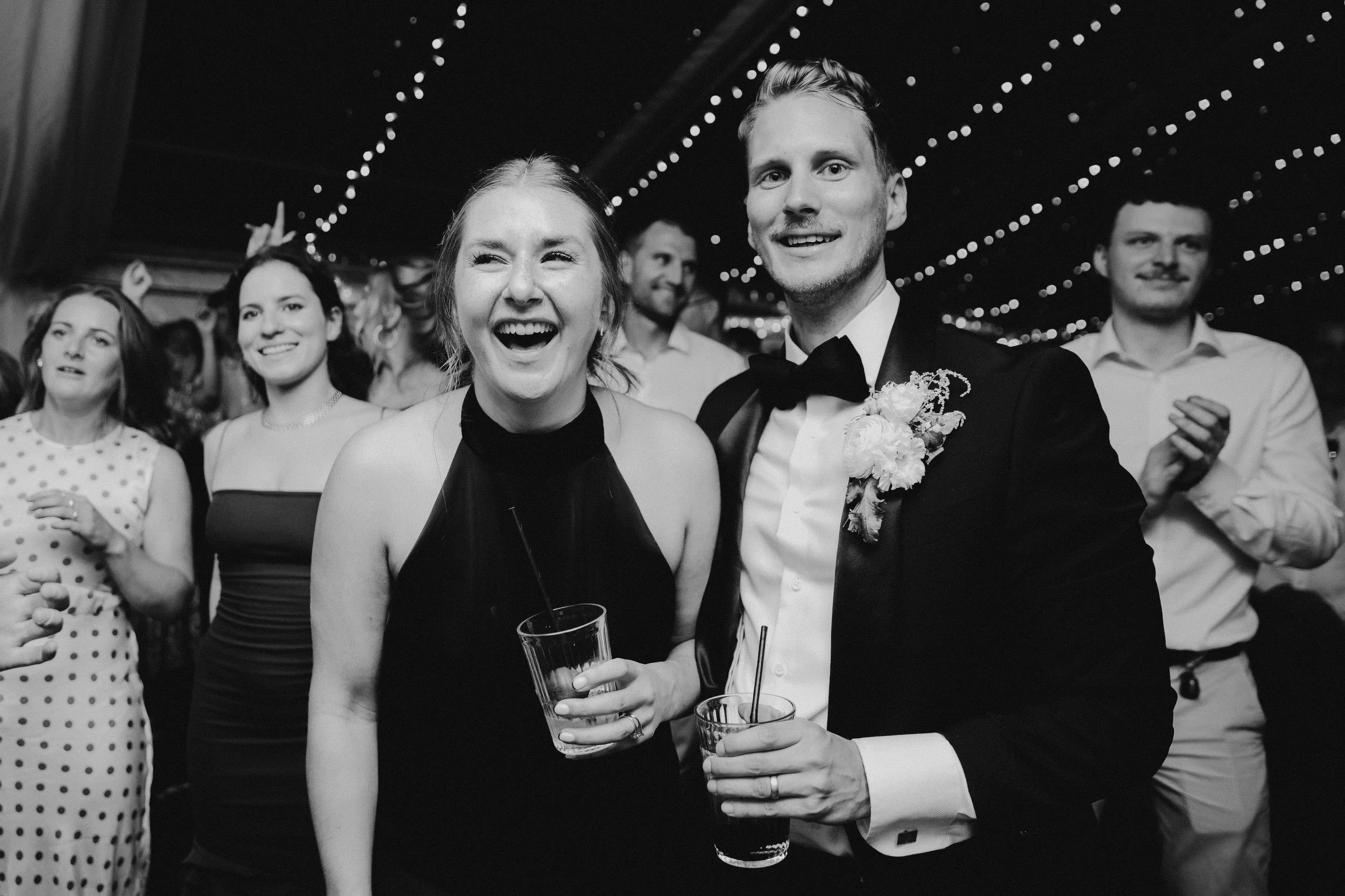Black and white image of bride and groom on the dancefloor at black tie wedding in Lincolnshire