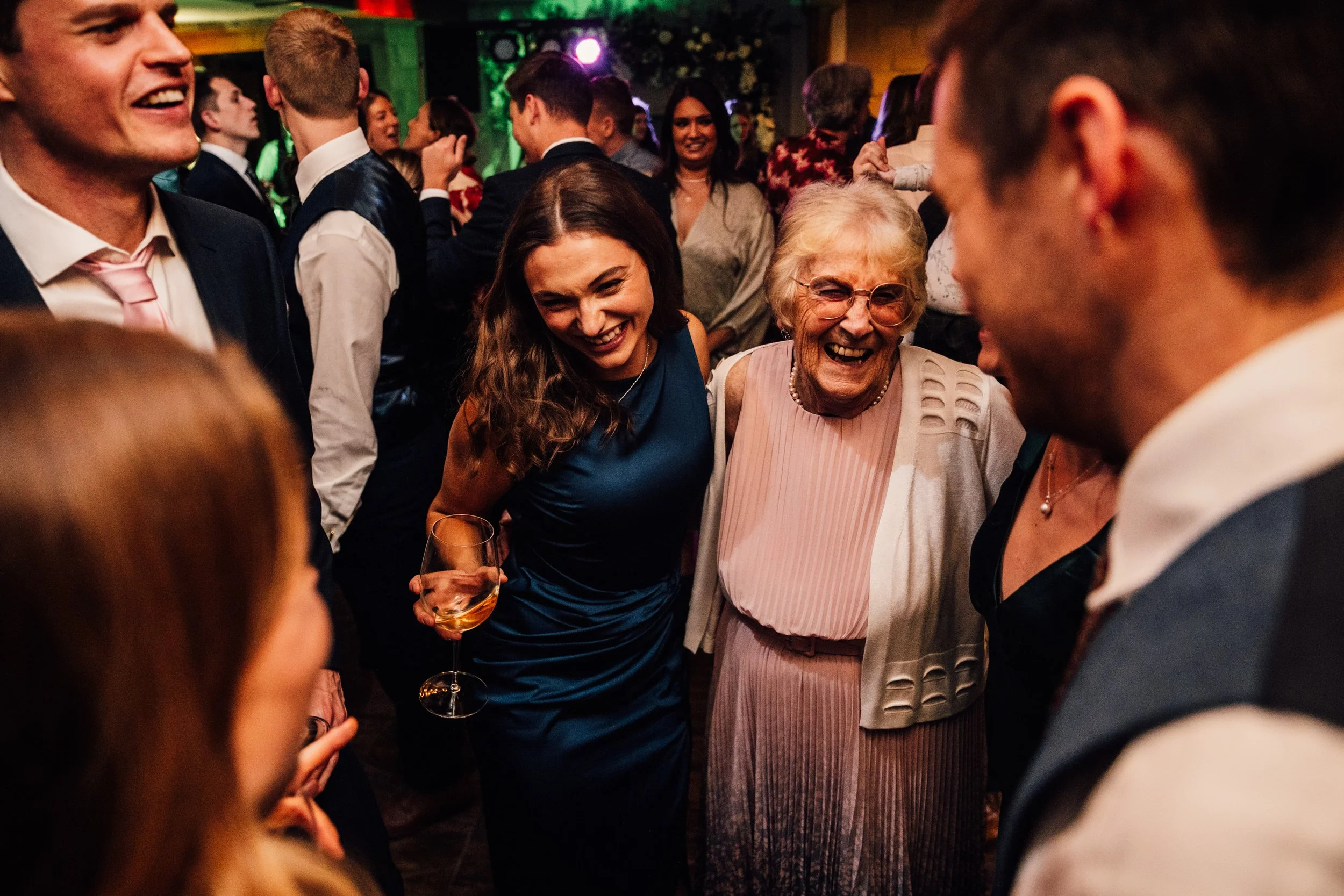 Documentary style wedding photography on the dance floor at Peak Edge Hotel wedding