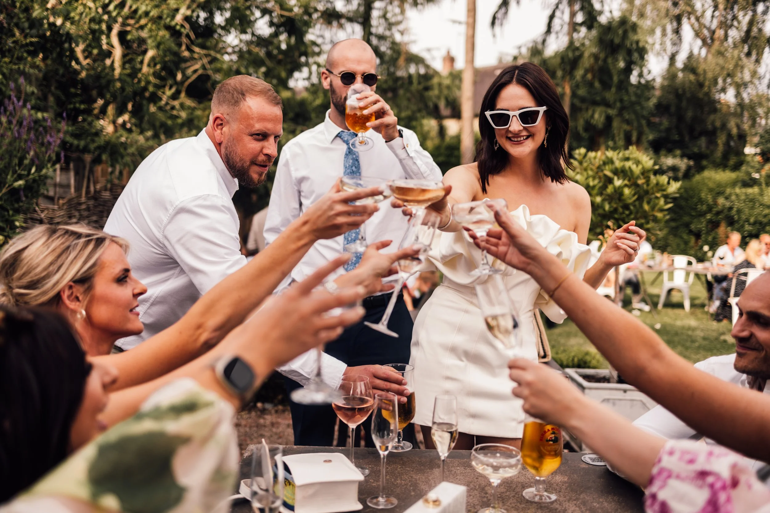 Candid photo of bride and guests at Derbyshire wedding