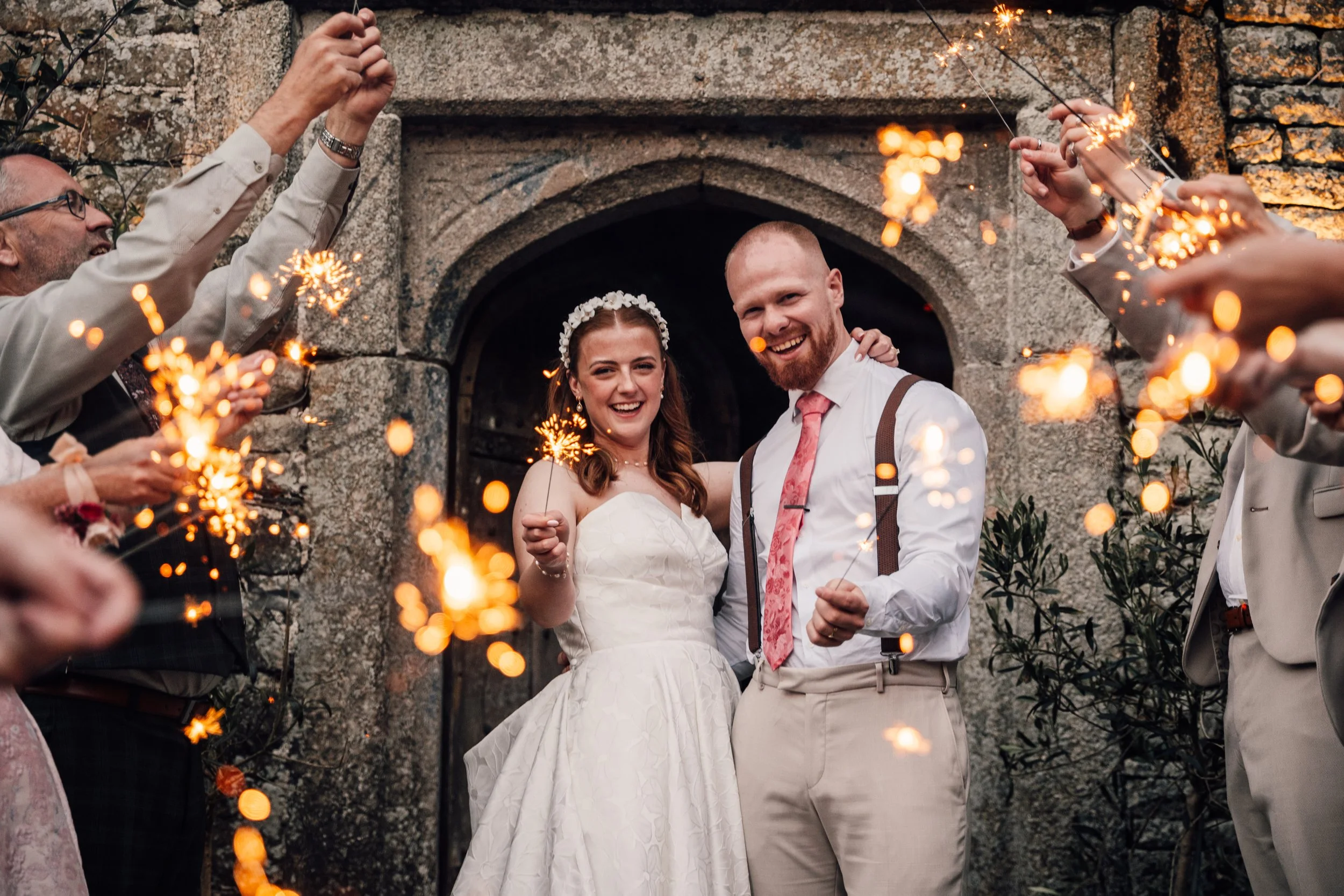sparkler wedding photo at Pengenna Manor near port Isaac in cornwall
