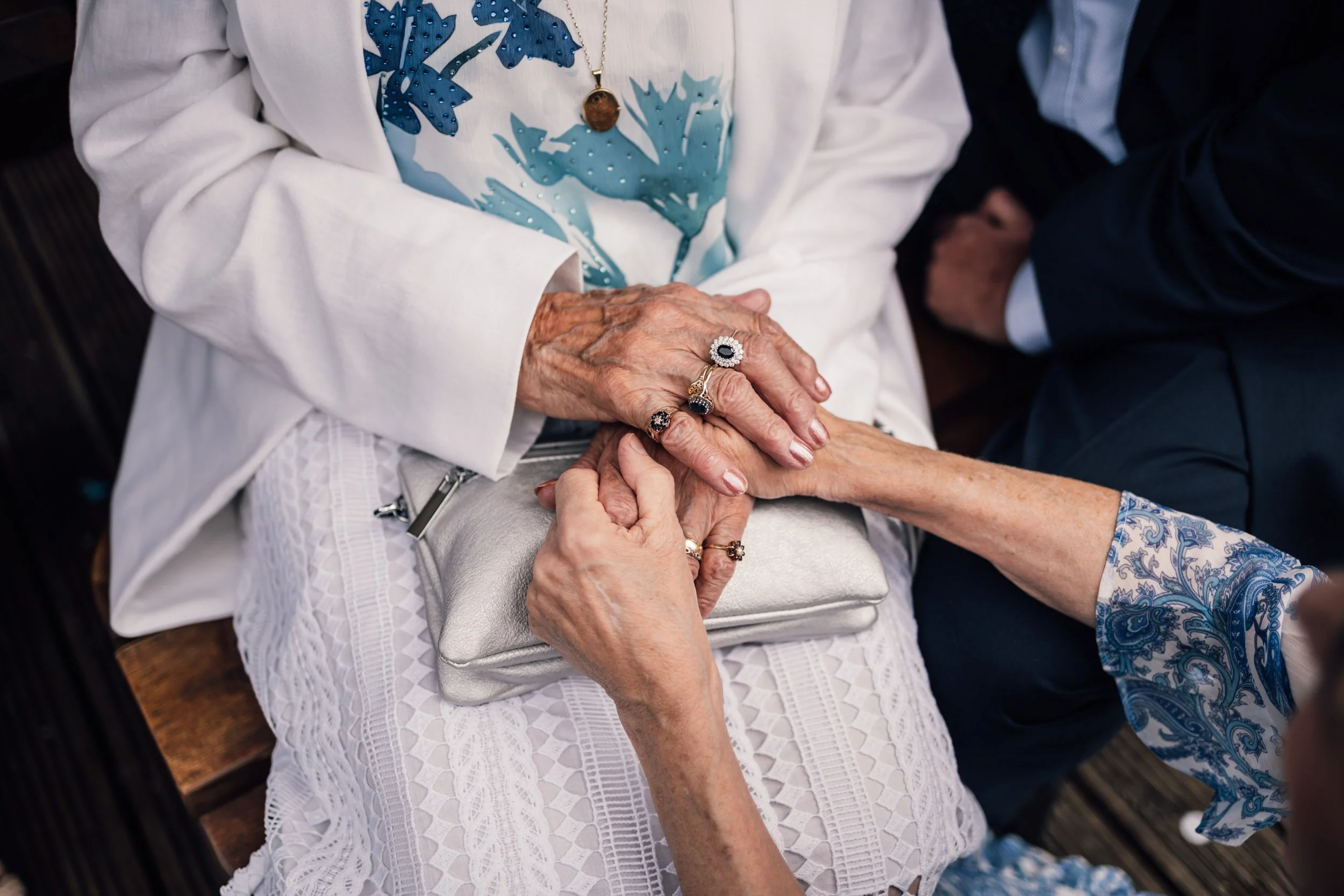 Guests holding hands at The Venue wedding in Halifax